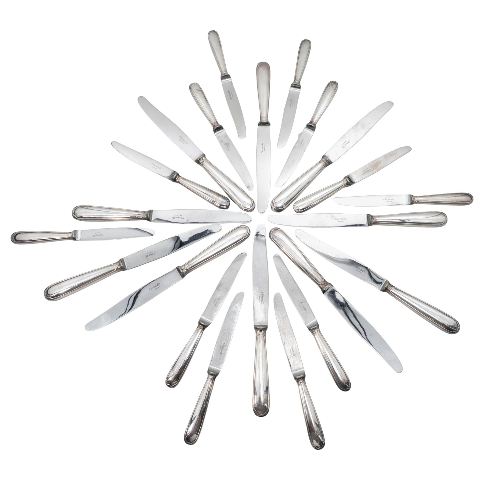 (24 pc) Christofle Silver Plated 'America' Dinner Knife Set: (24 pc) Christofle Silver Plated 'America' Dinner Knife Set 20th Century, France Collection of twenty-four Christofle silver-plated knives in the iconic America pattern, comprising dessert knives and 