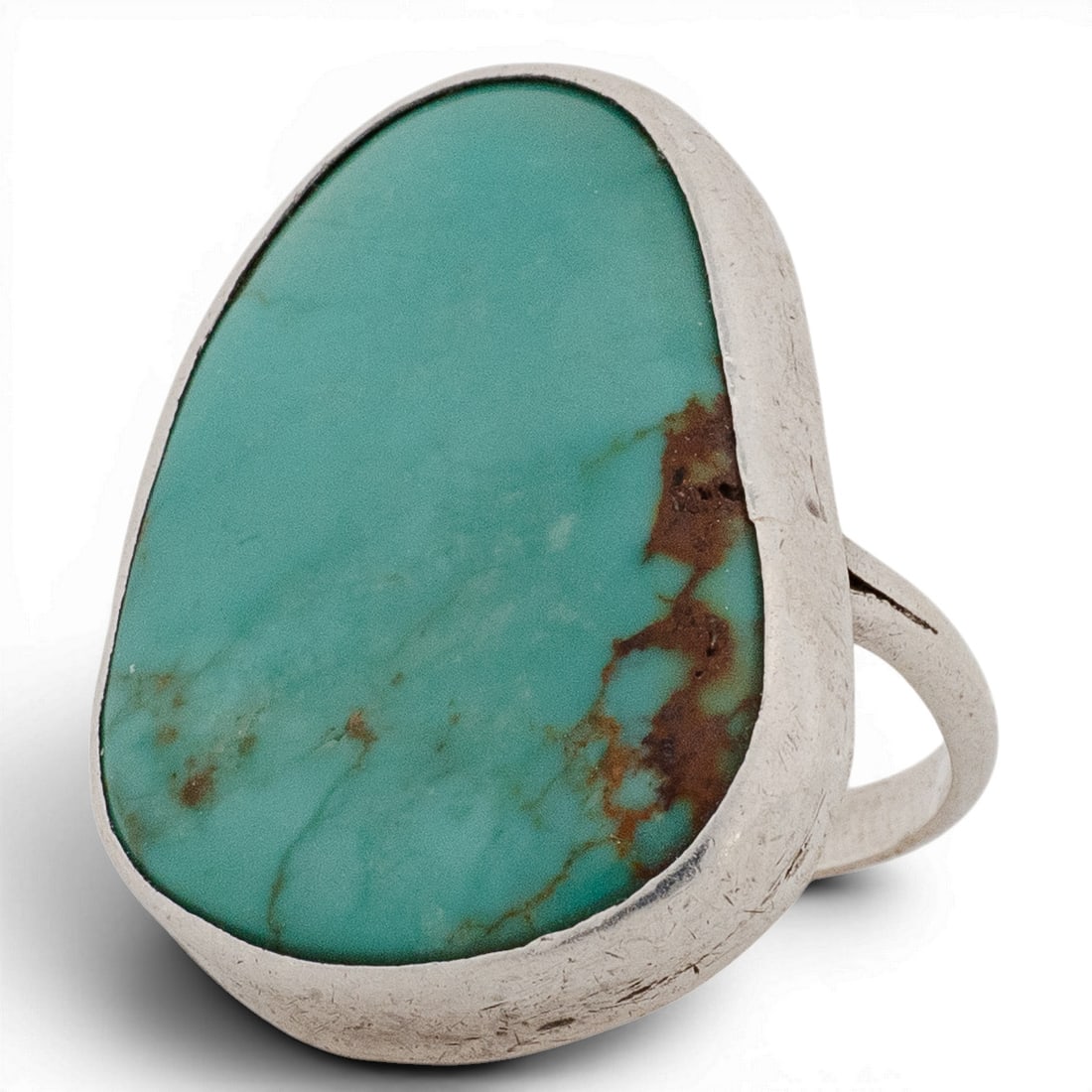 Vintage Southwestern Sterling Silver & Turquoise Ring: Vintage Southwestern Sterling Silver & Turquoise Ring 1970s-1980s, USA Handcrafted sterling silver ring featuring a large freeform turquoise cabochon measuring approximately 18mm x 23mm, in a smooth b