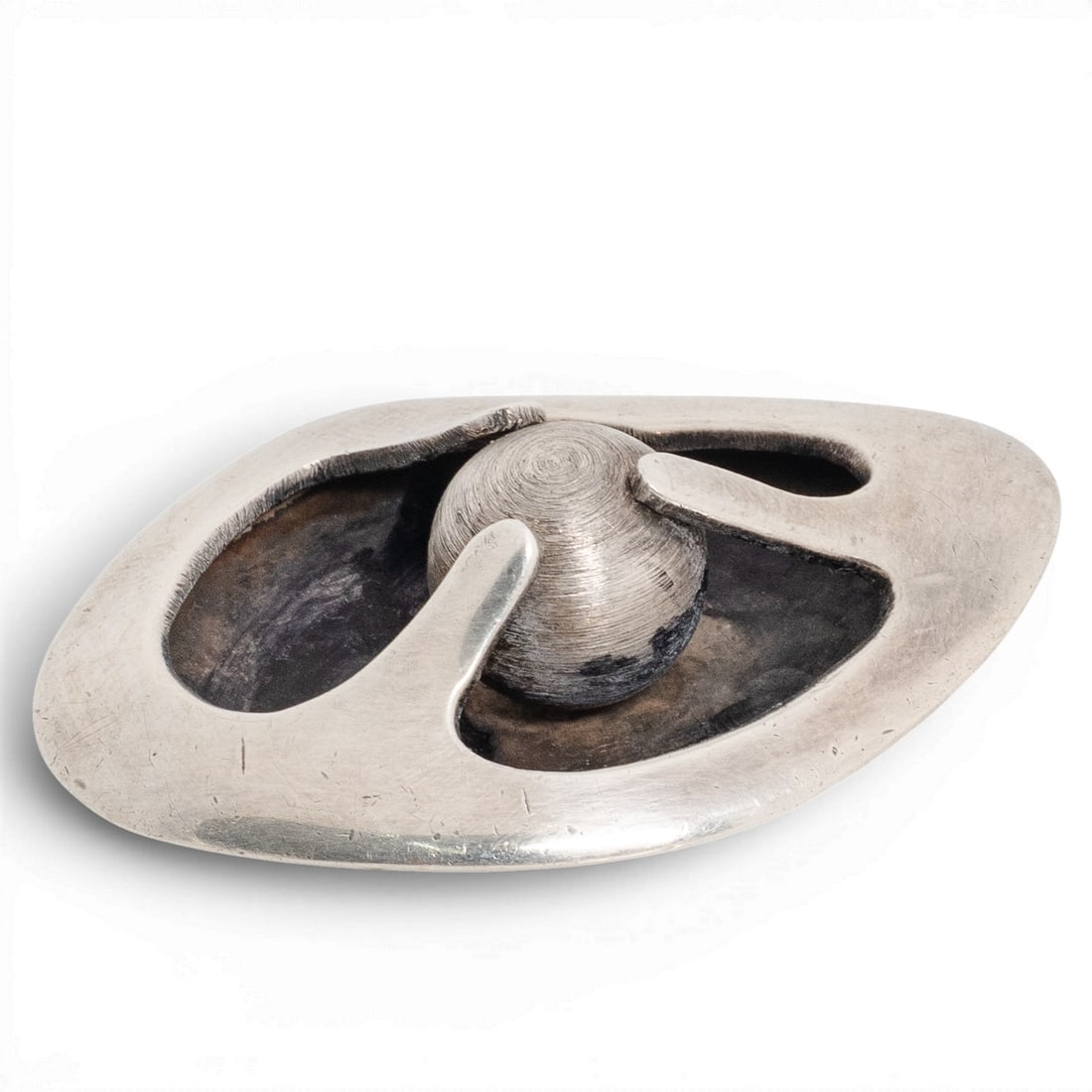 Vintage Sigi Pineda Taxco Sterling Silver Modernist Brooch: Vintage Sigi Pineda Taxco Sterling Silver Modernist Brooch 1960s-1970s, Mexican Sterling silver modernist brooch by Sigi Pineda featuring an abstract biomorphic openwork design centered by a raised sp