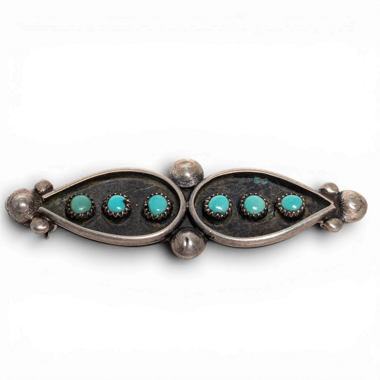 Vintage Sterling Silver & Turquoise Bar Brooch: Vintage Sterling Silver & Turquoise Bar Brooch 1970s-1980s, USA Handcrafted sterling silver bar brooch featuring six round turquoise cabochons in serrated bezel settings arranged within opposing openw