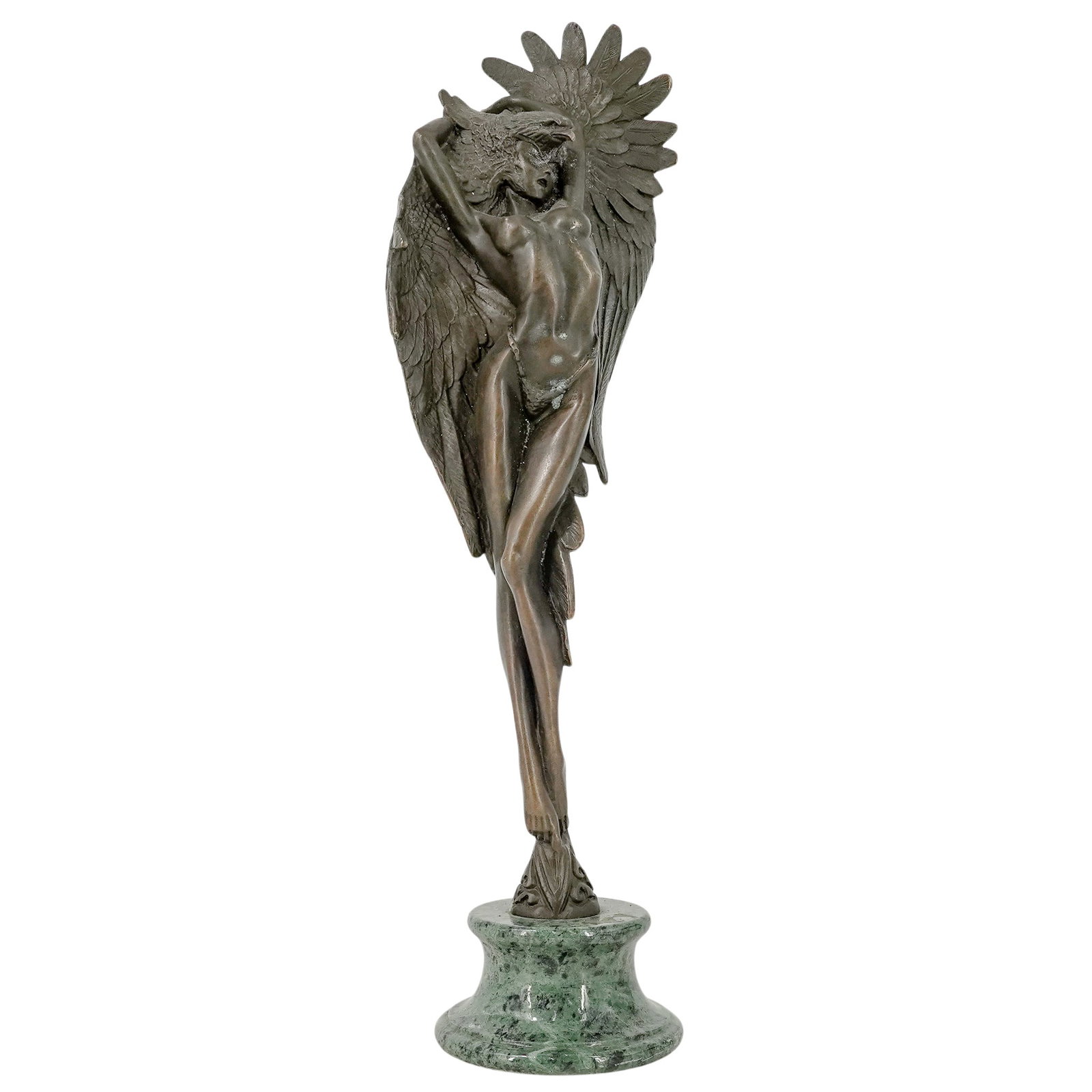 Cast Bronze Sculpture Nude Female Wearing Eagle Headdress: Cast Bronze Sculpture Nude Female Wearing Eagle Headdress 20th century, USA Cast Bronze Sculpture of a standing slender nude female wearing an eagle or hawk headdress. The bronze sculpture is mounted 