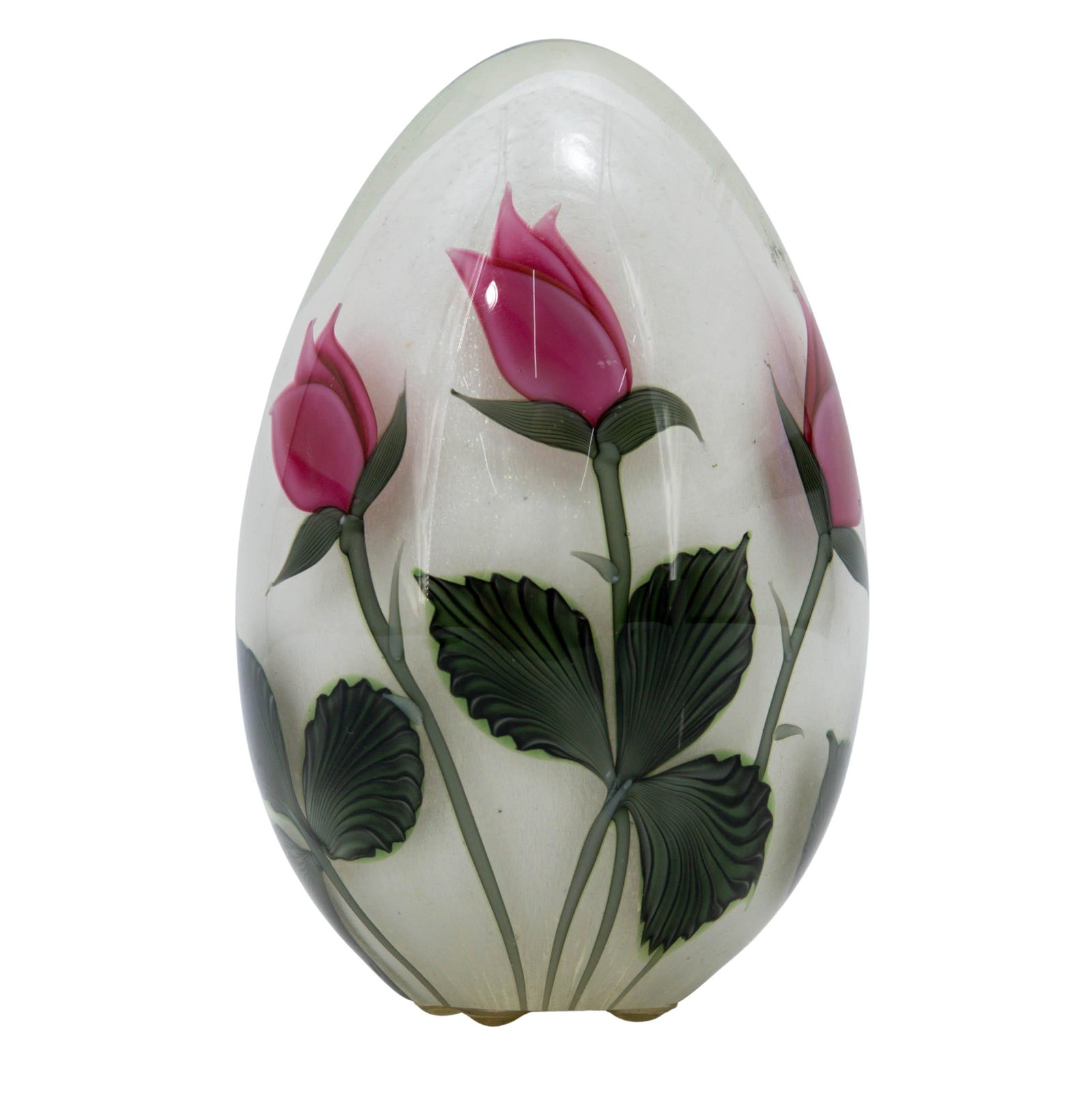 Bruce Sillars x Orient & Flume Glass Egg Paperweight: Bruce Sillars x Orient & Flume Glass Egg Paperweight 20th Cent. American It features intricate lampwork inside clear glass, showing two pink rosebuds on thorned stems with dark green leaves. It still 