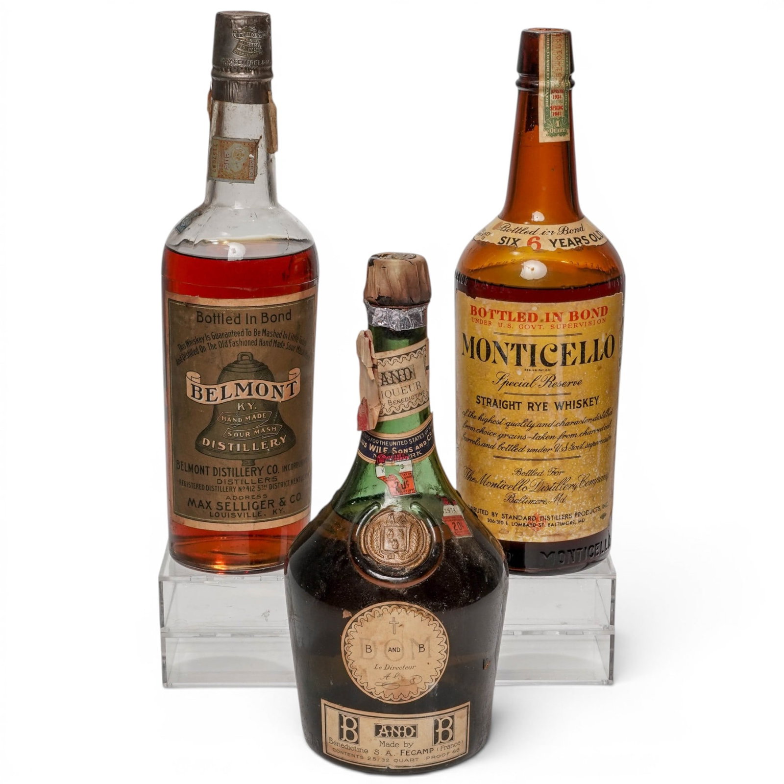 (3 pc) Vintage Belmont Sour Mash w/ Monticello Rye Whiskey & B&B Liqueur Bottles: (3 pc) Vintage Belmont Sour Mash w/ Monticello Rye Whiskey & B&B Liqueur Bottles c. 1920s-1960s, USA, France Lot includes: (1) Belmont Handmade Sour Mash Whiskey, bottled by Max Selliger & Co. in Loui