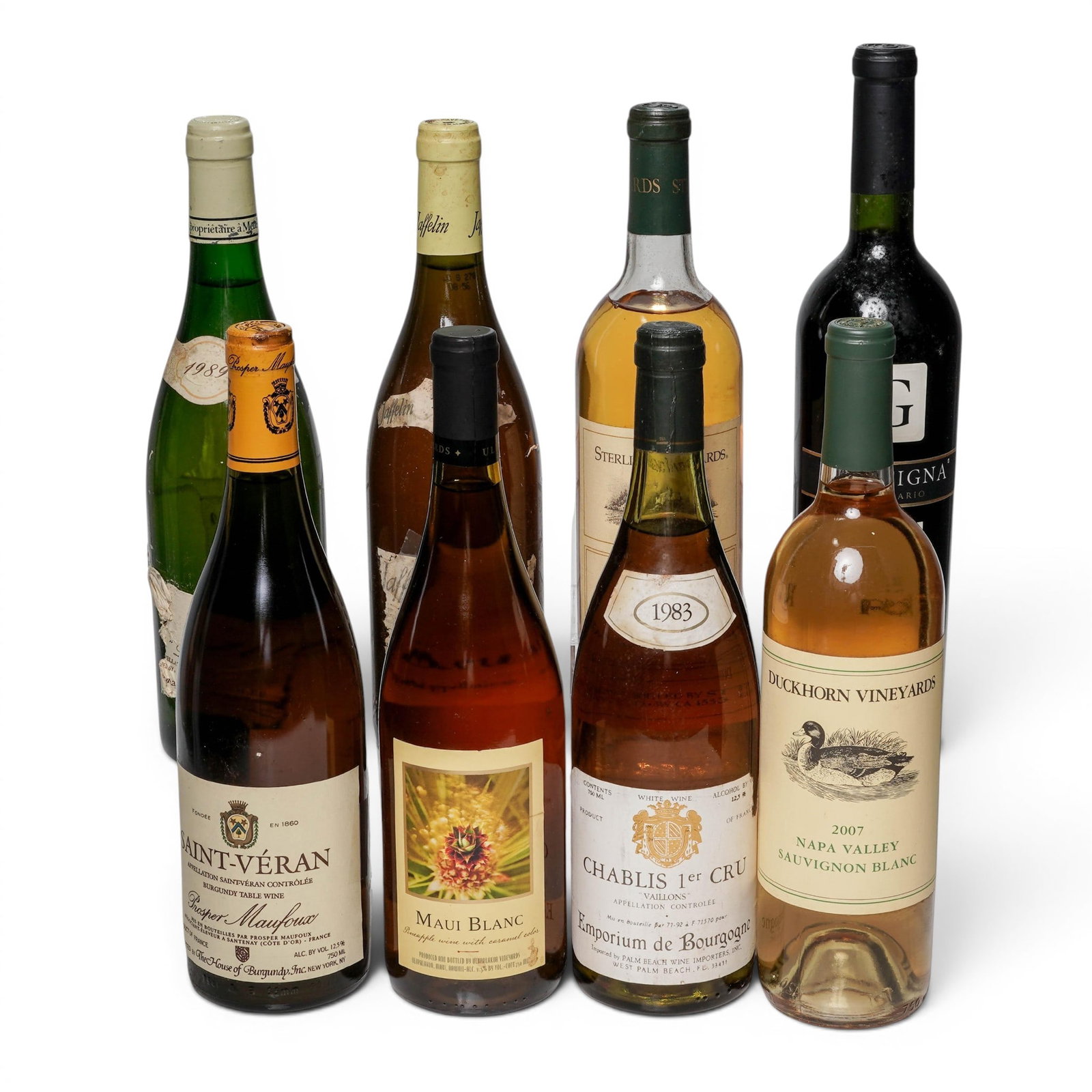 (8pc) Lot of White & Red Wine Collection: (8pc) Lot of White & Red Wine Collection 20th Cent. French, American, Argentinian The collection includes: (1)Sterling Vineyards Sauvignon Blanc (1991) is a wine from the Napa Valley region of
