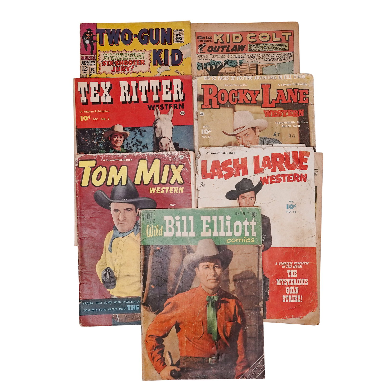 (7 pcs) Vintage Western Comics: (7 pcs) Vintage Western Comics Mid to late 20th century, American Seven vintage western comics. (1) Dell Comics "Wild Bill Elliot" Comics No. 5, June-July 1951. (1) Fawcett Publications "Lash LaRue