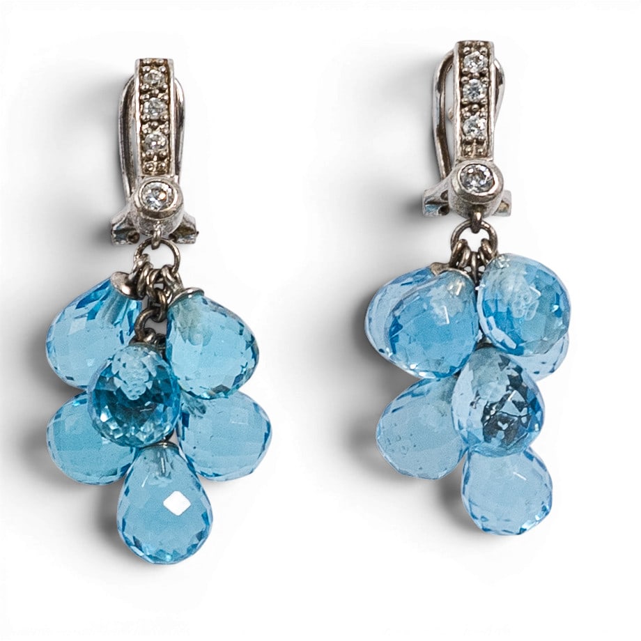 Sterling Silver CZ & Aquamarine Briolette Cluster Earrings Signed: Sterling Silver CZ & Aquamarine Briolette Cluster Earrings Signed Late 20th Century Sterling silver dangle earrings with clustered faceted aquamarine briolette drops, CZ accent stones, articulated lin