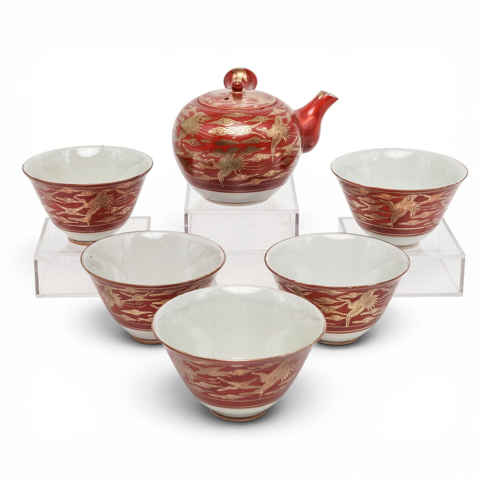 (6 pcs) Japanese Kutani Ware Tea Set: (6 pcs) Japanese Kutani Ware Tea Set 20th century, Japanese Six piece Japanese Kutani ware tea set. (5) Tea cups. Marked on bottom with Kutani maker's mark. Measurements: H 2.5" x Diameter 3.75" (1) T