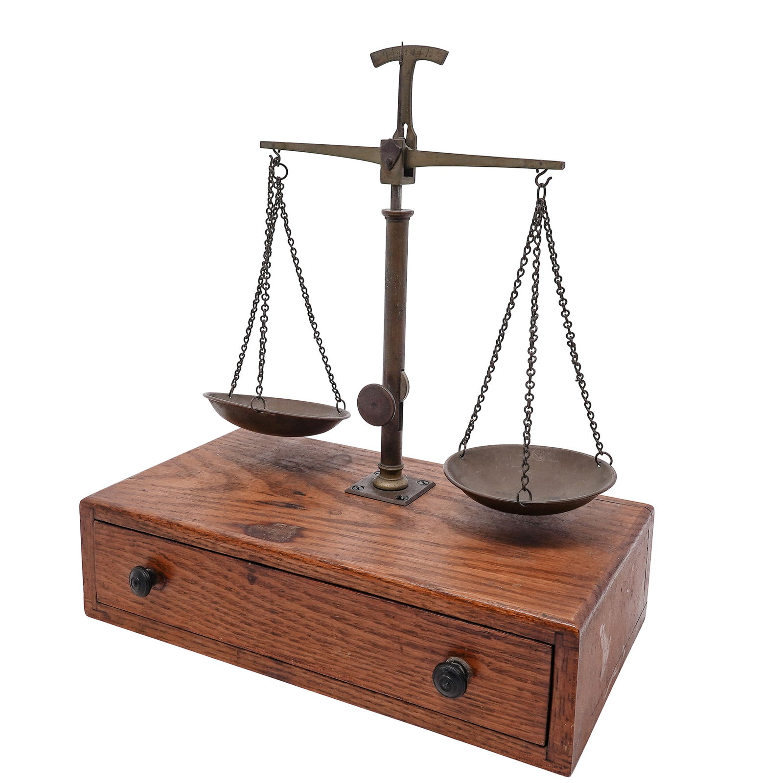 Antique Apothecary Balance Scale: Antique Apothecary Balance Scale Early 20th Cent, USA Antique apothecary balance scale featuring a brass beam with dual suspended weighing pans and a central upright support mounted on a shaped base. 