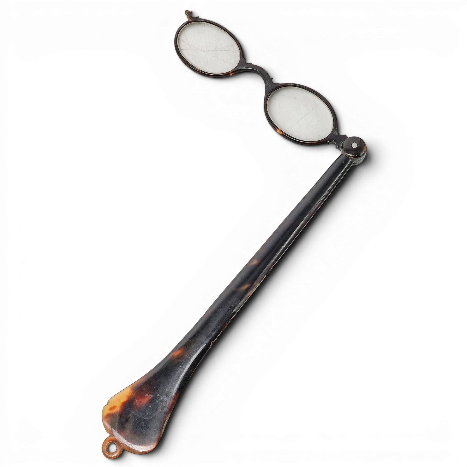 Antique Tortoise-Hued Lorgnette: Antique Tortoise-Hued Lorgnette Late 19th to early 20th Cent., European Antique folding lorgnette, a stylish form of handheld eyewear popular in the 19th and early 20th centuries. It features a pair