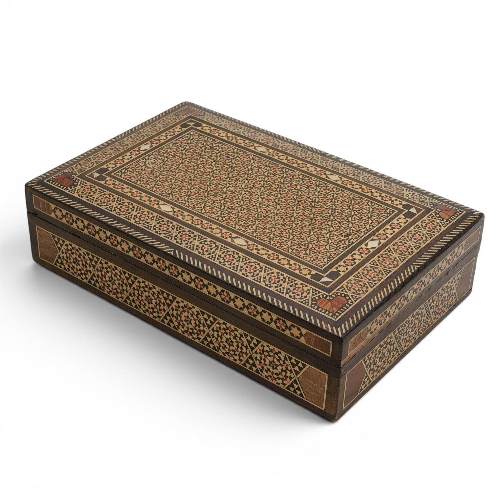 Vintage Moroccan Inlaid Mother-Of-Pearl Jewelry Box: Vintage Moroccan Inlaid Mother-Of-Pearl Jewelry Box Mid 20th Cent. Moorish The piece is crafted using intricate, labor-intensive geometric inlay work composed of tiny, precisely cut strips of wood, bo