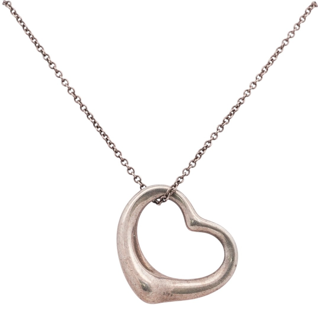 Tiffany & Co. Elsa Peretti Open Heart Sterling Silver Pendant Necklace: Tiffany & Co. Elsa Peretti Open Heart Sterling Silver Pendant Necklace Late 20th Century, USA Designer necklace by Elsa Peretti for Tiffany & Co., featuring the iconic sculptural Open Heart pendant