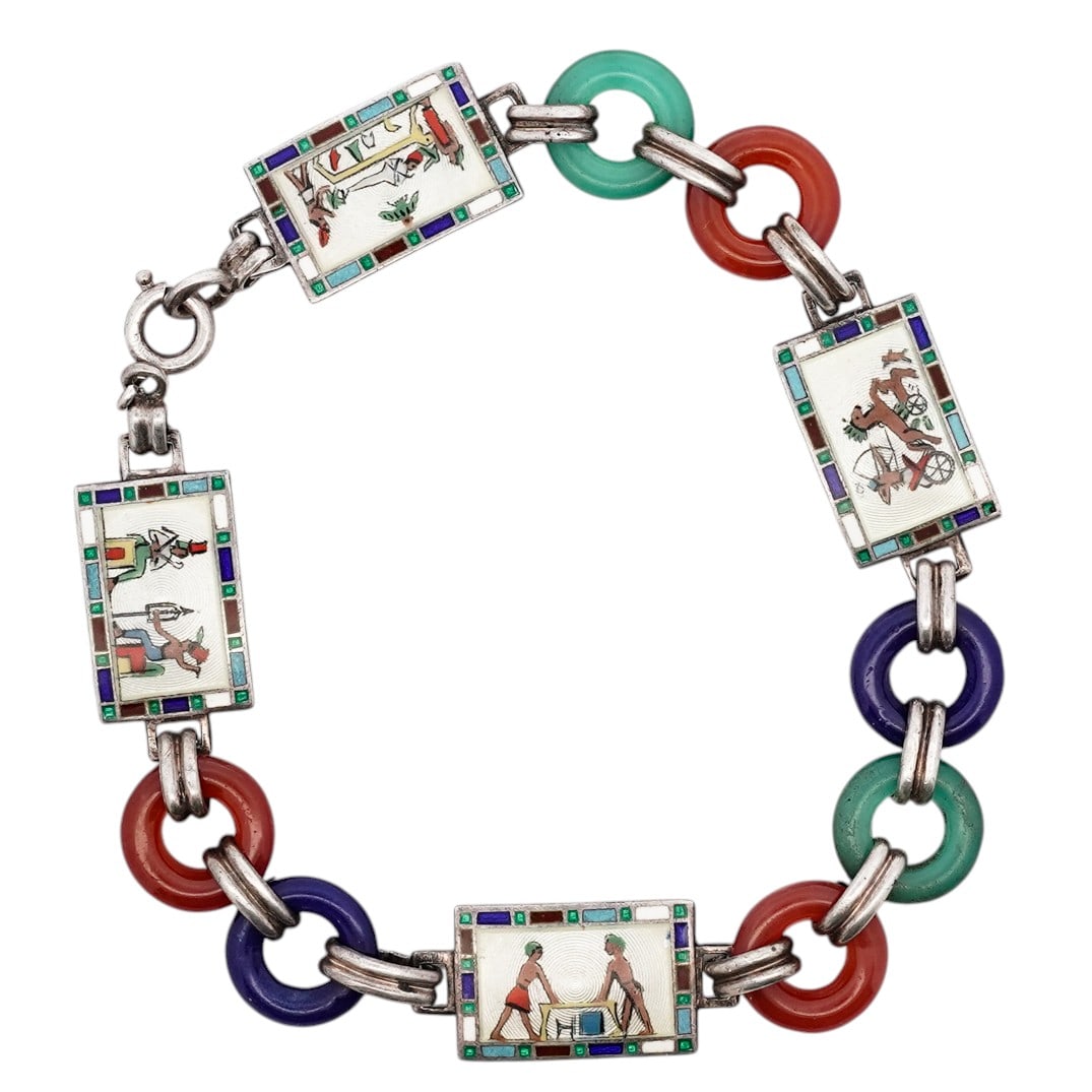 Egyptian Revival Silver Enamel Panel Bracelet, Signed: Egyptian Revival Silver Enamel Panel Bracelet, SignedMid 20th Century, EuropeanBracelet composed of rectangular enamel panels depicting stylized Egyptian figures in polychrome enamel over engine-turne
