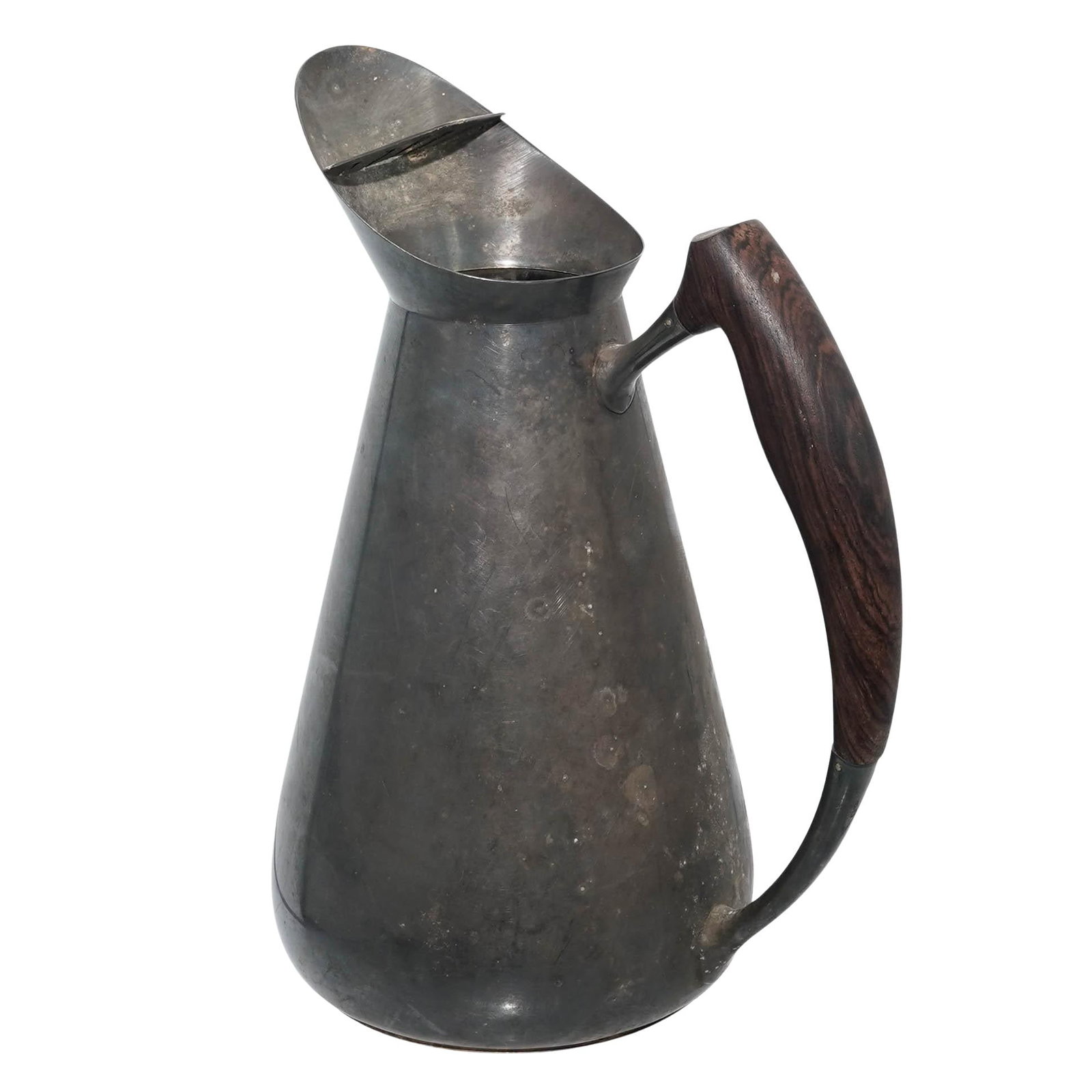 Carl F. Christiansen Danish Silver-Plated w/ Wood Handle Pitcher: Carl F. Christiansen Danish Silver-Plated w/ Wood Handle Pitcher20th century, DenmarkA "modernist" Danish design characterized by clean lines and an angled spout. The pitcher is marked with a crown ov