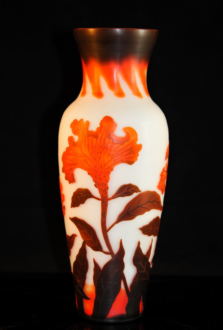 French Galle style cameo flower vase. Signed: DESCRIPTION: Large French Galle style cameo flower vase. Milk glass ground color with gorgeous fire orange flowers with dark orange foliage towards the base. The mouth features a brown bordering hue w