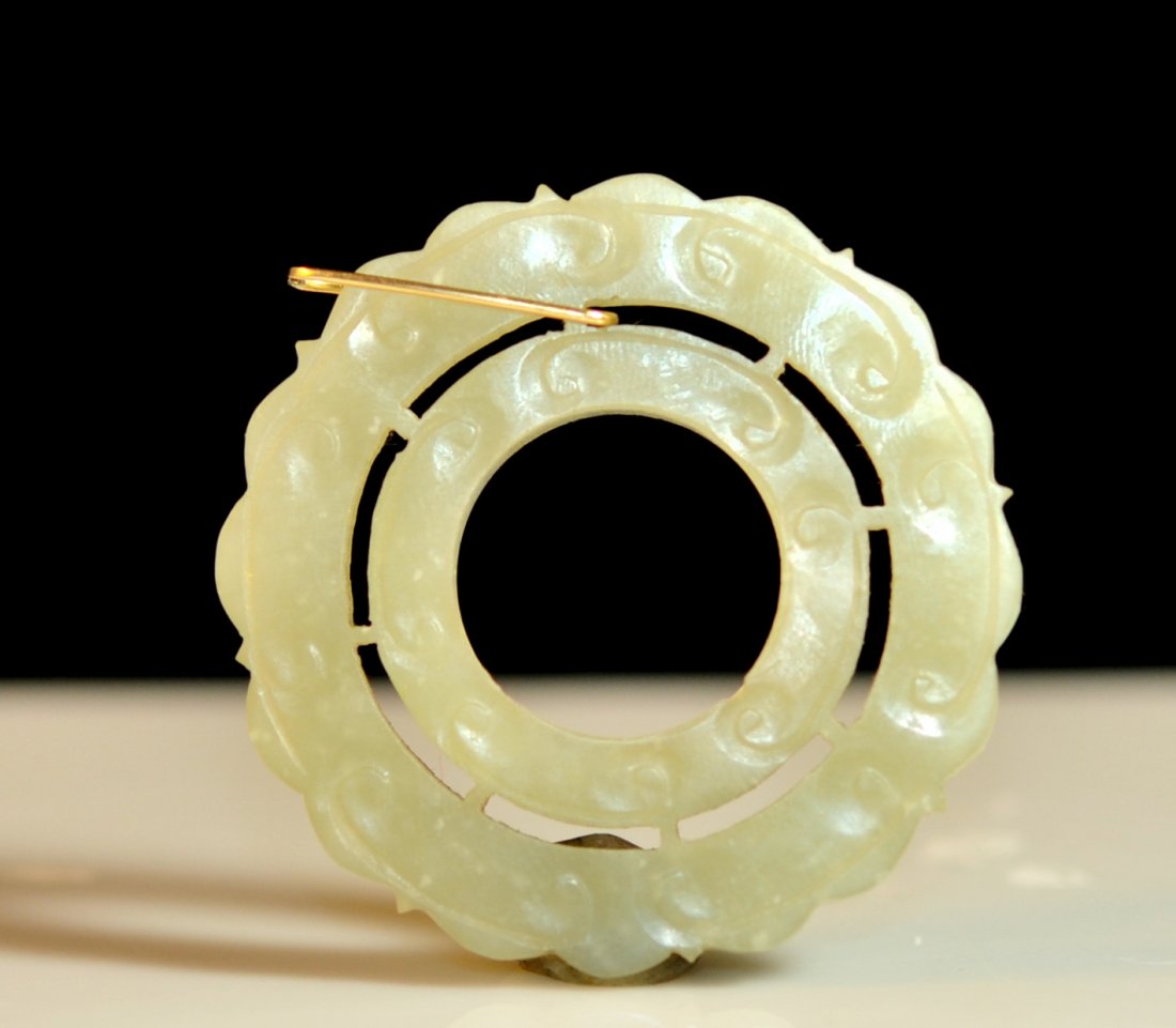 Antique Chinese jade and 14k pendant: DESCRIPTION: Antique Chinese jade and 14k pendant. Light green hand carved jade pendant with engraved luck symbols throughout. 14k yellow gold pin in place as the chain link. Overall great condition w