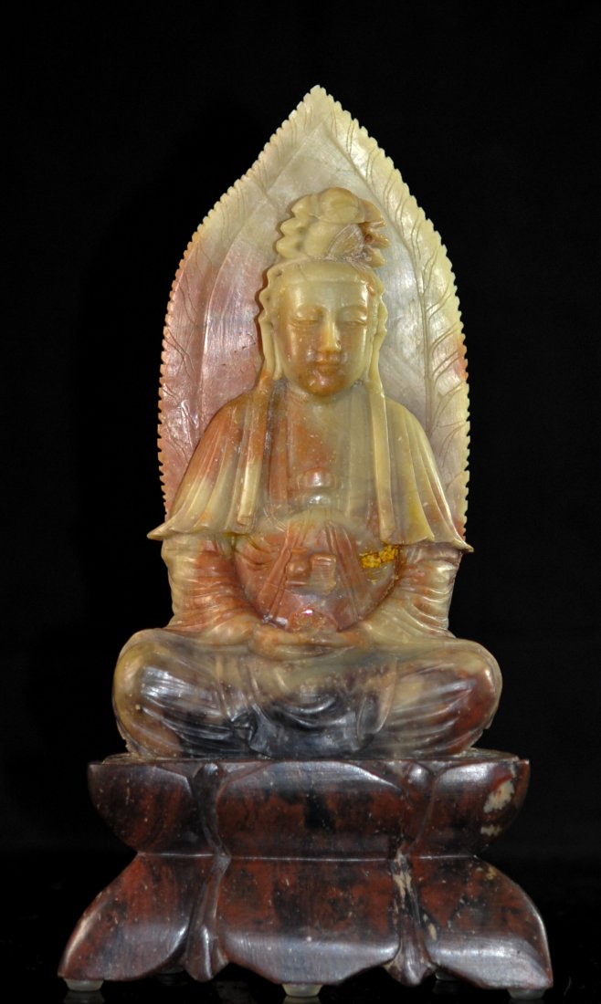 Vintage Asian hand carved soapstone figure: DESCRIPTION: Vintage Asian hand carved soapstone figure. Features a Goddess sitting at meditation on her throne. gorgeous colors which graduate from dark to light. Repair in the center of the piece. O