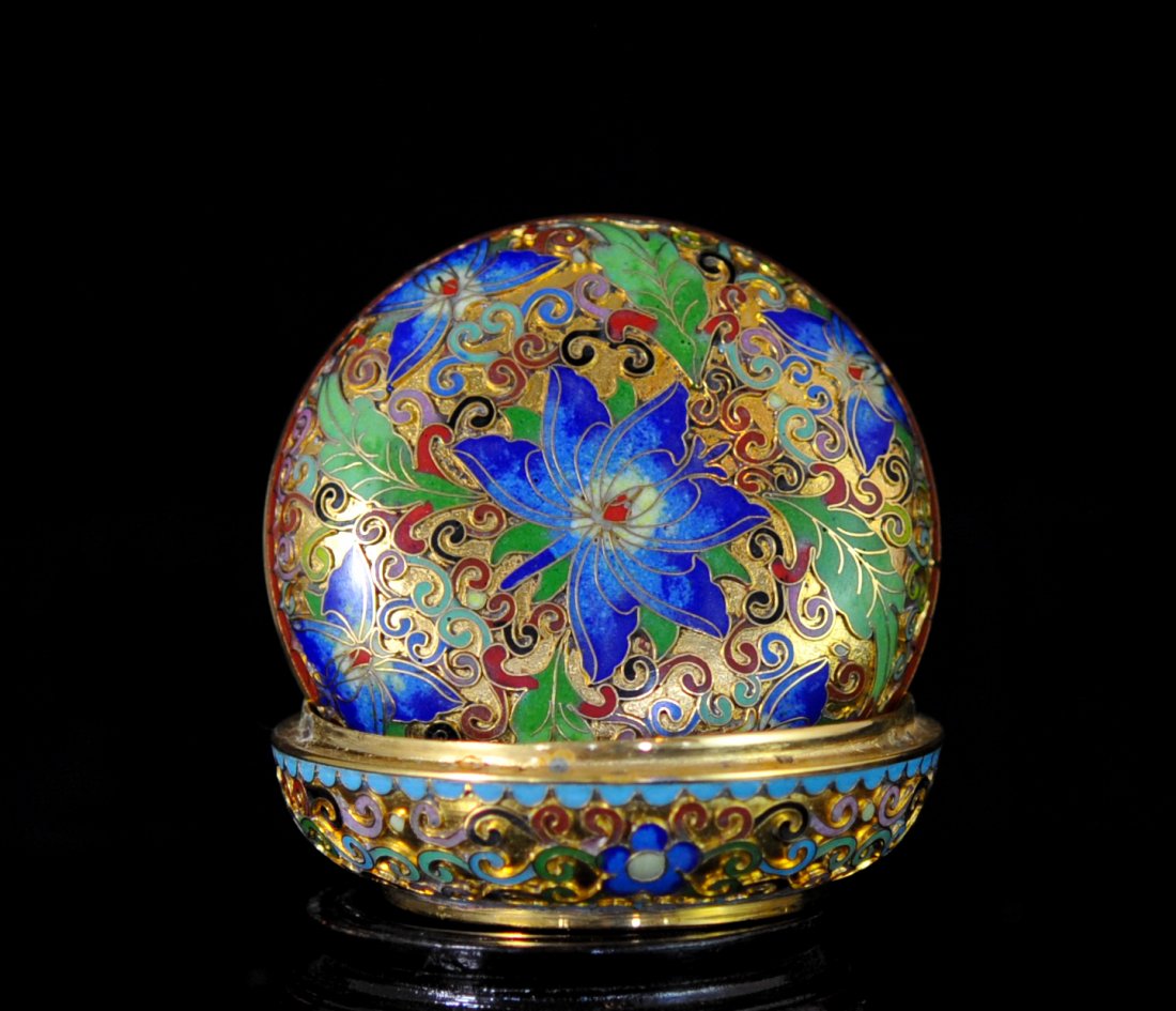 Chinese champleve enamel lidded jar with base: DESCRIPTION: Chinese champleve enamel lidded jar with base. Features raised lotus flower champleve designs with foliate and ribbon accents. Turquoise enamel interior and bottom. Gold granular ground c
