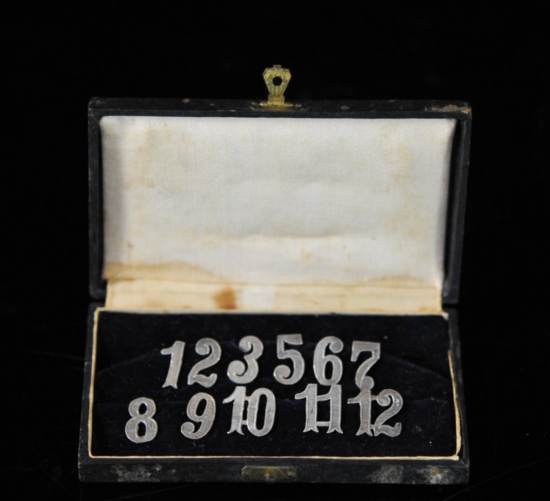 Dutch silver number pins in original box: DESCRIPTION: Dutch silver number pins in original box. Miniature hand made Dutch (835 silver) numbers. Each with groove design fronts and smooth backs. Hallmarked on the front of each. Comes in origin