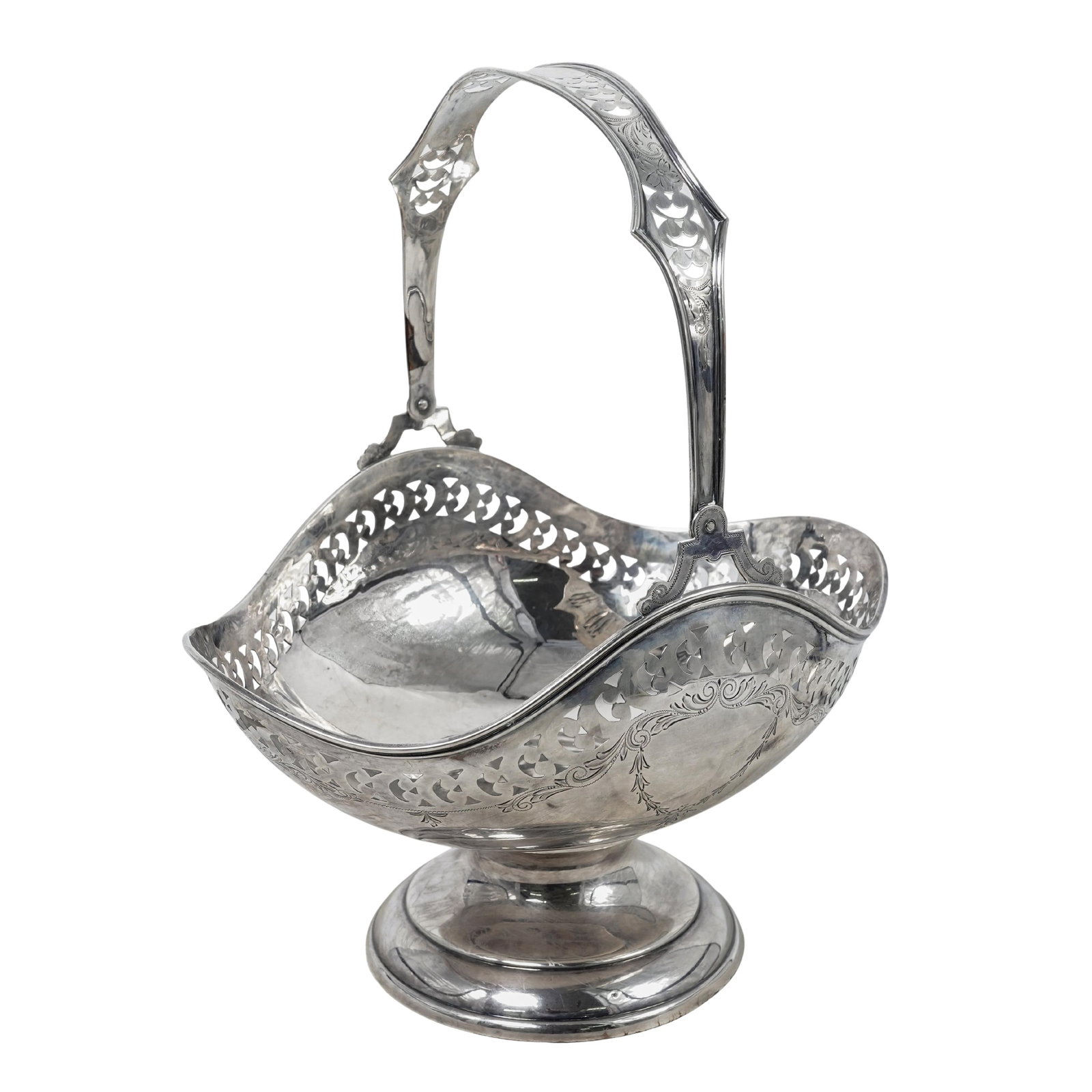 Antique Sterling Silver Pierced Pedestal Basket: Antique Sterling Silver Pierced Pedestal BasketEarly 20th century, SwedishThis antique sterling silver pierced pedestal bowl features a deeply scalloped, undulating rim and is supported by a weighted,