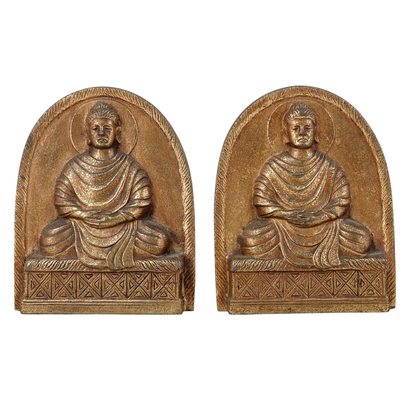 Tiffany Studios "Gold Dore" Bronze Bookends: Tiffany Studios "Gold Dore" Bronze BookendsEarly 20th century, AmericanThis pair of Tiffany Studios bronze bookends features a stylized, textured pattern with a high-relief image of a seated Buddha on