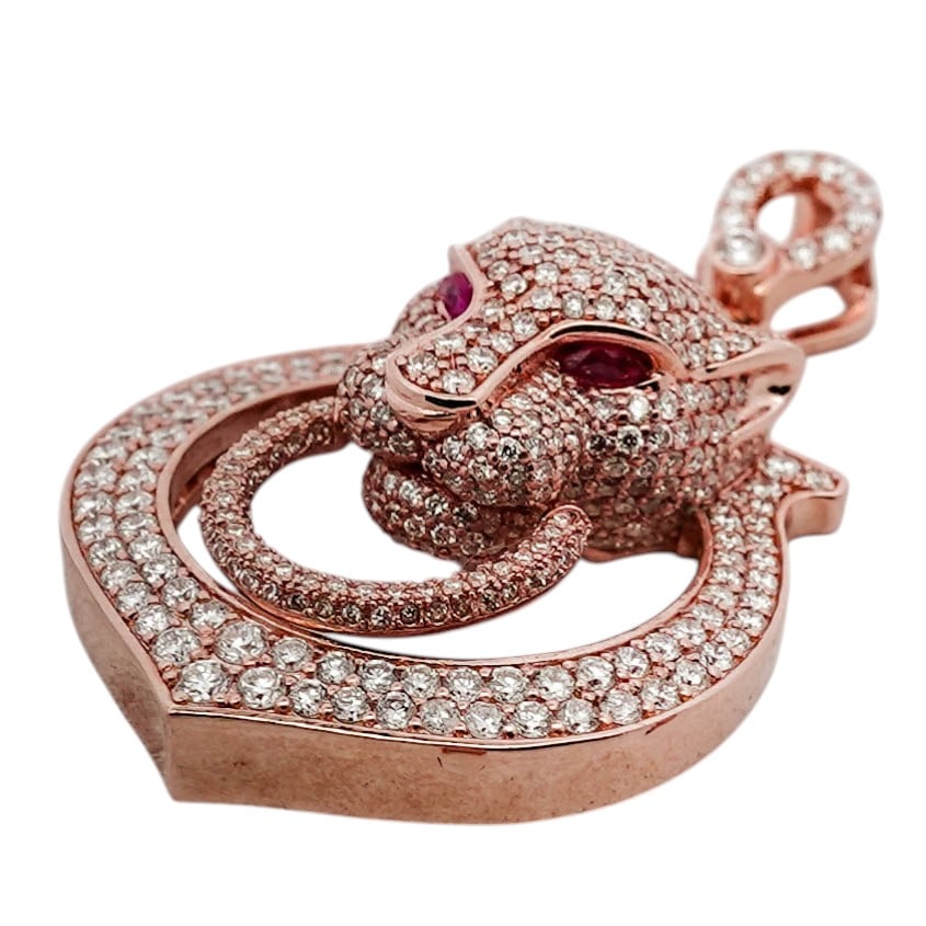 14K Rose Gold & CZ Panther Head Pendant: 14K Rose Gold & CZ Panther Head PendantLate 20th–early 21st century14k rose gold pendant formed as a stylized panther head issuing from a hinged circular drop, pavé-set throughout with round brilli