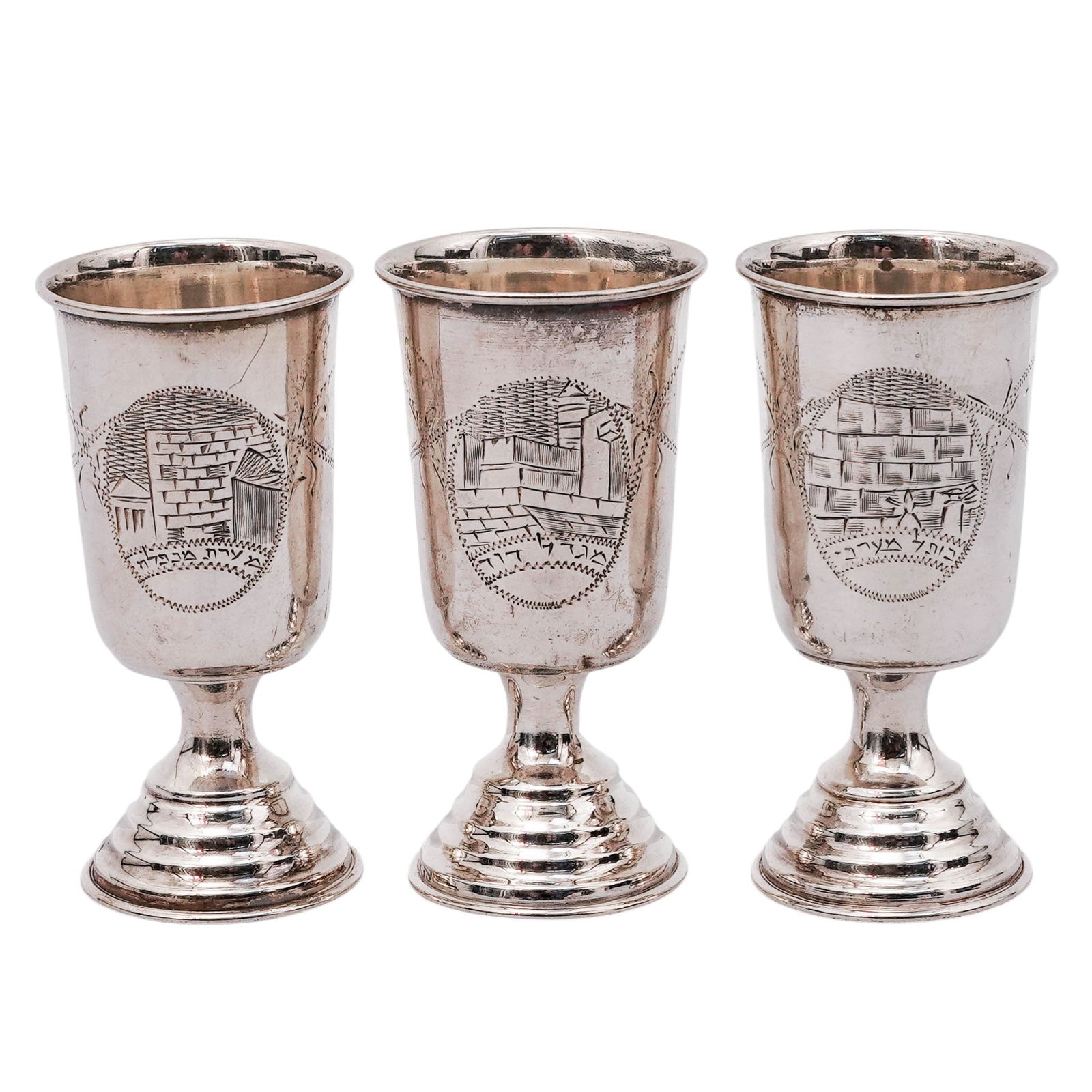 (3 pcs) Leo Gersting 833 Silver Kiddush Cups: (3 pcs) Leo Gersting 833 Silver Kiddush Cups20th centuryA set of three Leo Gersting 833 silver Kiddush cups with engraved designs. Each marked on rim "LG 833 silver". Total weight: 45 grams.H 2.75" x