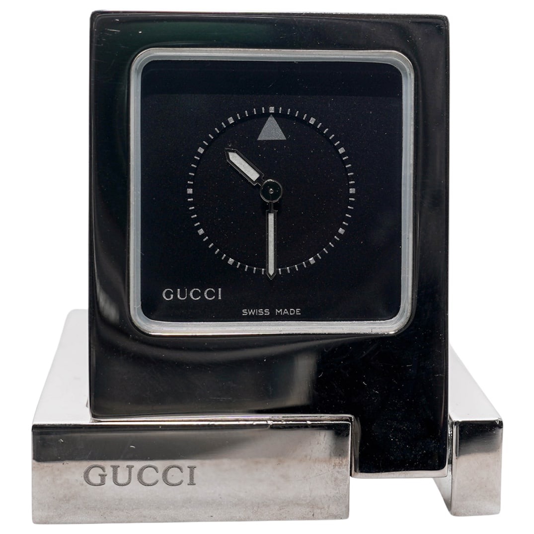 Vintage Gucci Stainless Desk Travel Alarm Clock - Model 0830: Vintage Gucci Stainless Desk Travel Alarm Clock - Model 083020th Century. Italy.Vintage Gucci Stainless Desk Travel Alarm Clock. Model 0830. It features a Swiss quartz movement, a classic analog dial,