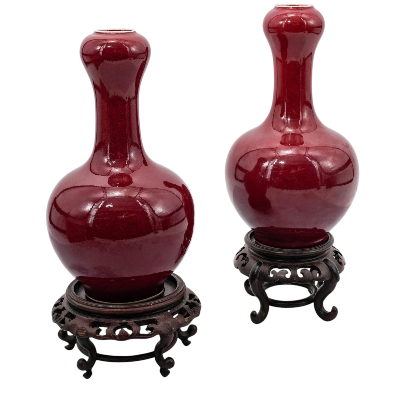 Pair Of Chinese Kangxi Copper Red-Glazed Suantouping Vases: Pair Of Chinese Kangxi Copper Red-Glazed Suantouping Vases18th Cent., ChineseChinese Qing Dynasty Kangxi period porcelain suantouping-form or “garlic-head” vases, characterized by a rounded bo