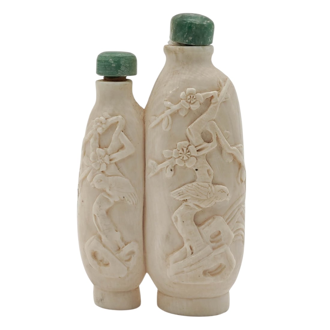 Antique Carved Bird Bone Double Snuff Bottle: Antique Carved Bird Bone Double Snuff BottleEarly 20th century, ChineseAn early 20th century bone double chamber snuff bottle with a carved bone birds and flowers design.H 3" x L 1.625" x W 1"