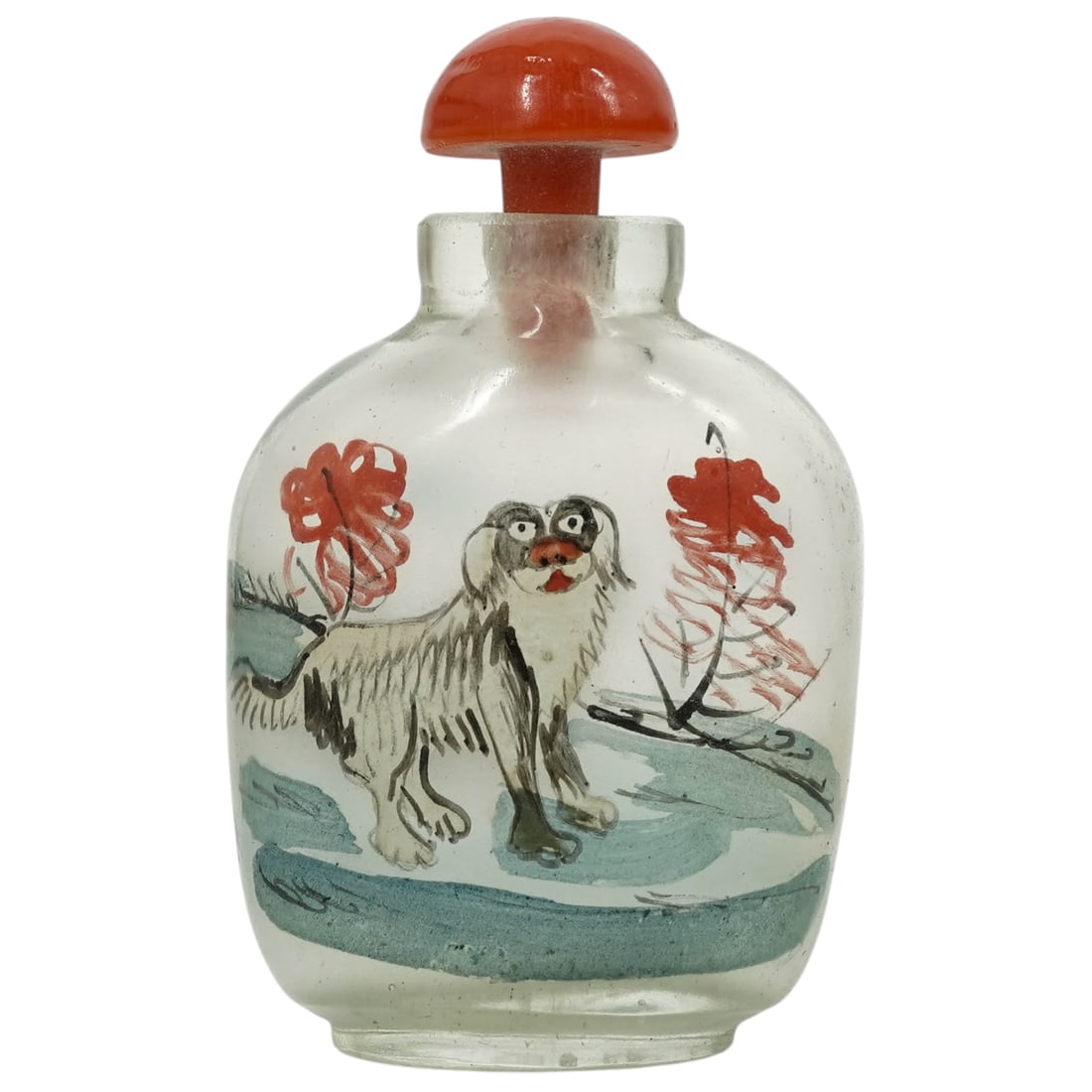 Chinese Reverse Painted Glass Dog Snuff Bottle: Chinese Reverse Painted Glass Dog Snuff Bottle20th century, ChineseChinese frosted glass snuff bottle with a coral top featuring reverse-painted images of dogs on both sides.H: 2.75" x W: 1" x L: 1.65