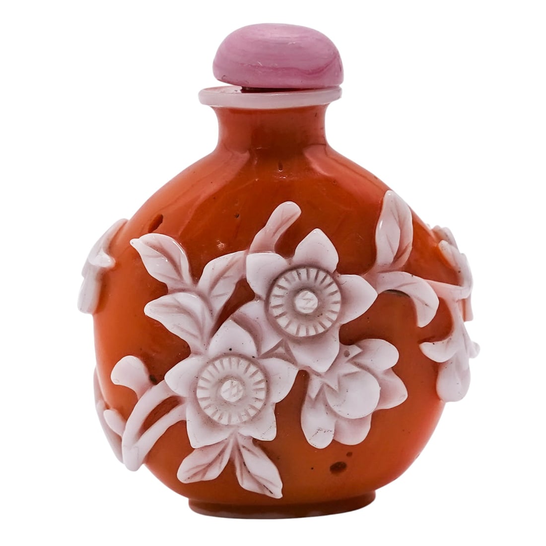 Chinese Peking Glass Floral Snuff Bottle: Chinese Peking Glass Floral Snuff BottleEarly-Mid 20th Century, China.Chinese Peking glass snuff bottle in orange color, with carved floral relief in contrasting white hue.H: 2 5/8"