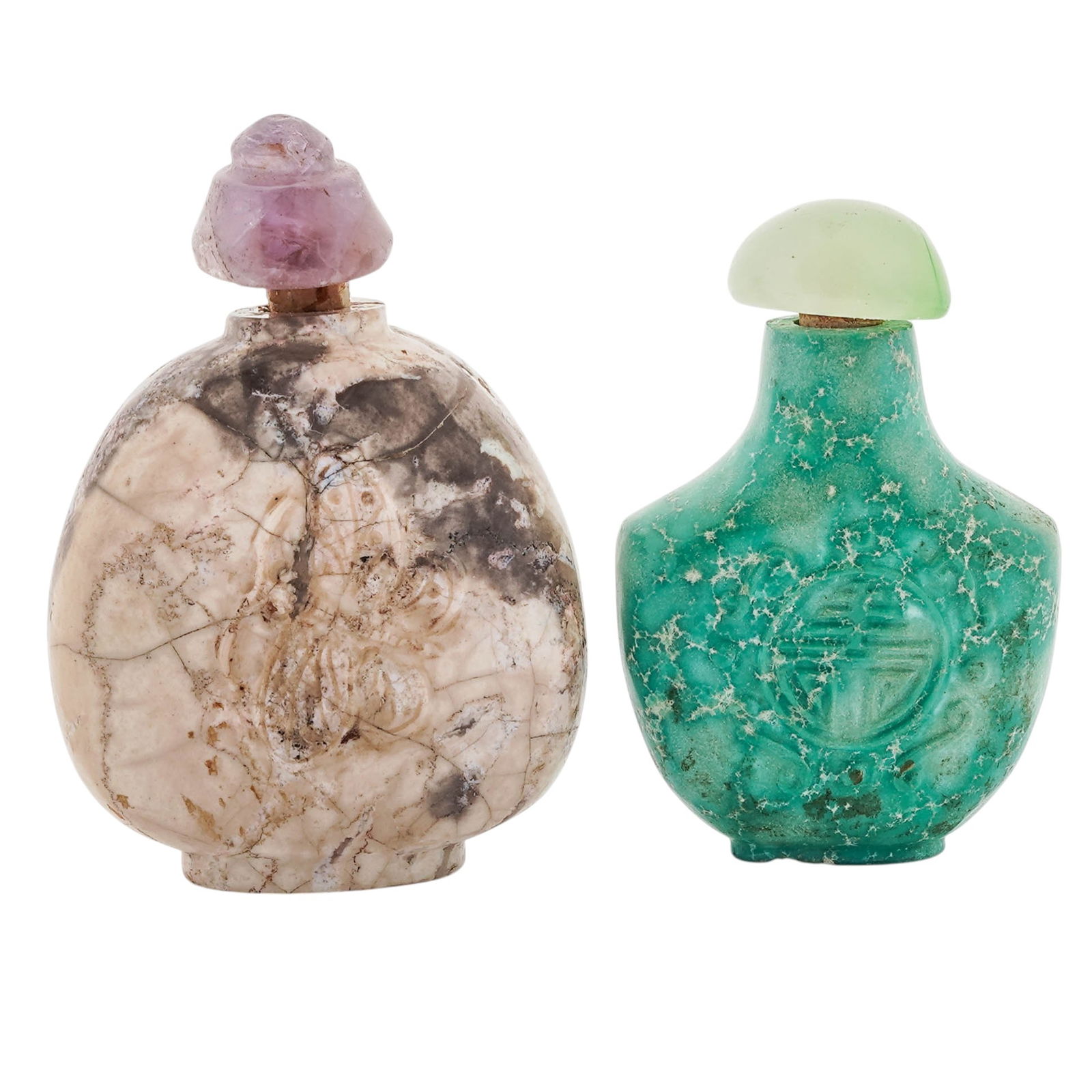 (2 Pc) Chinese Carved Stone Snuff Bottles: (2 Pc) Chinese Carved Stone Snuff Bottles20th Century, China.(2 Pc) A pair of Chinese carved hardstone snuff bottles with assorted carved motifs and stoppers.H: 2 1/4" and H: 2 5/8"
