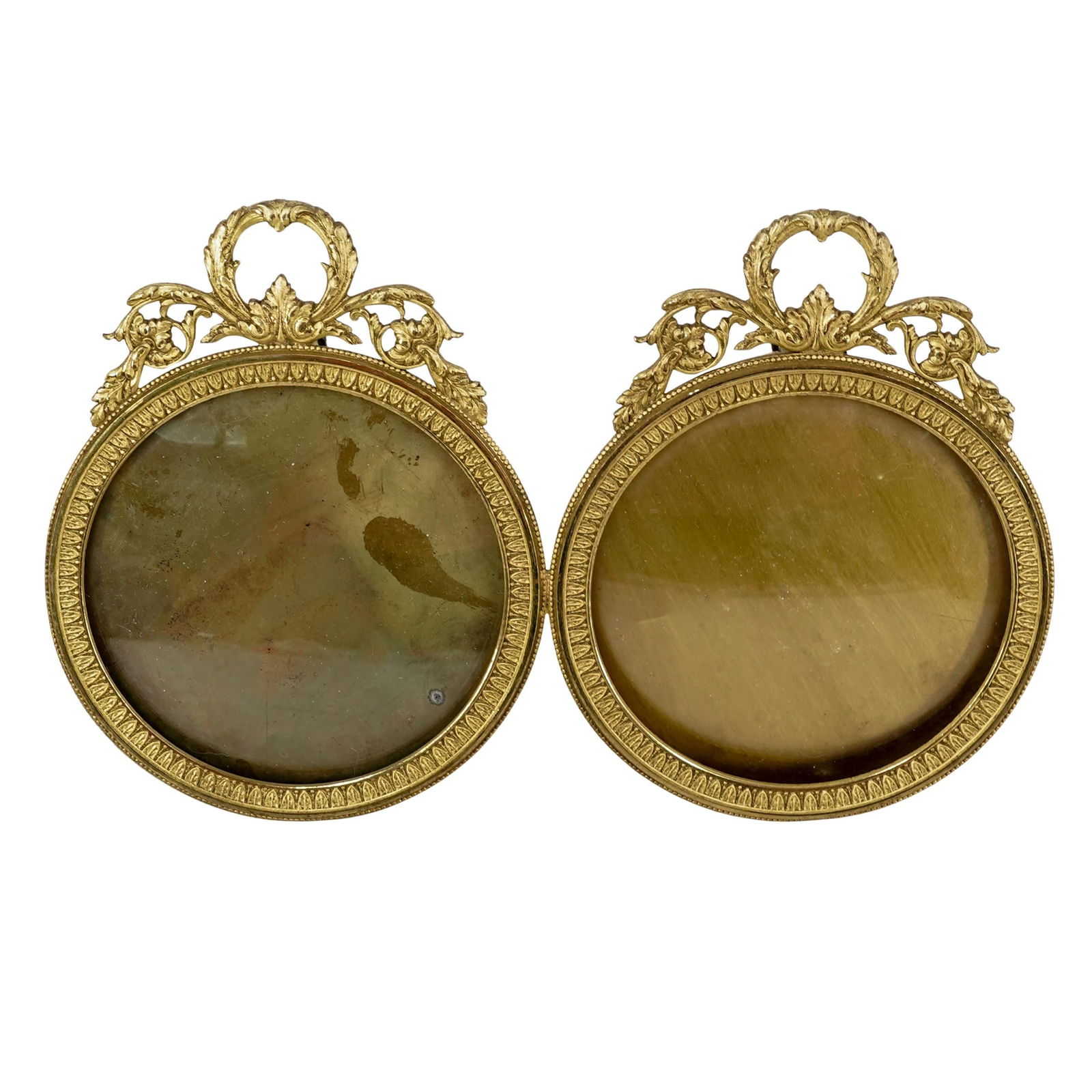 Napoleon III French Ormolu Double Picture Frame: Napoleon III French Ormolu Double Picture Frame1880-1900. FrenchThe double frame designed in the Louis XVI style, characterized by neoclassical motifs. It features circular apertures with intricate ri