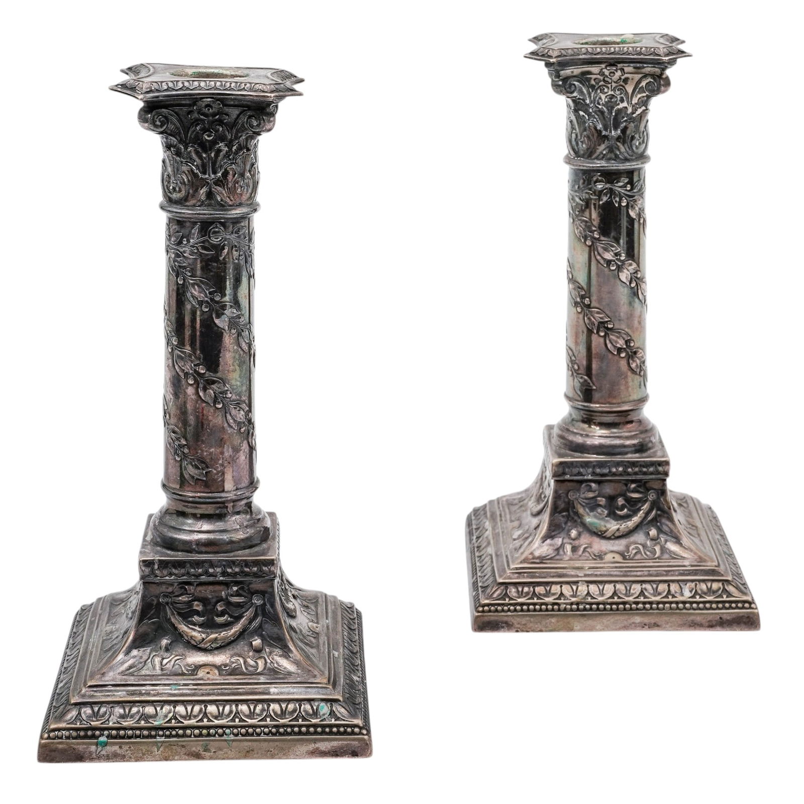 Pair Of WMF German Silverplate Neoclassical Candlesticks: Pair Of WMF German Silverplate Neoclassical CandlesticksEarly 20th century, GermanPair of Wurttembergische Metallwarenfabrik German silver-plated candle holders in an ornate, classical column style fe
