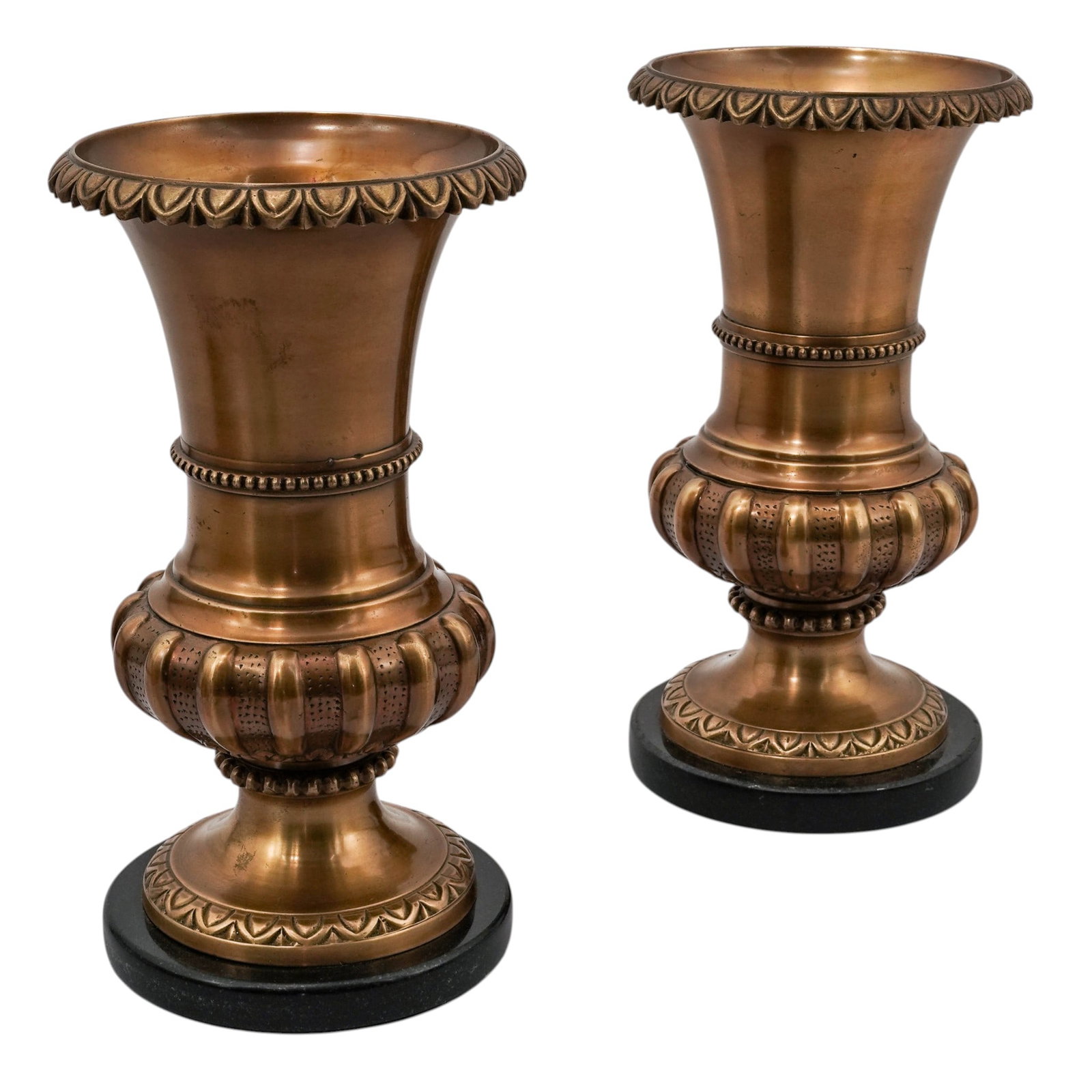 Pair of Antique Neoclassical Bronze on Marble Urns: Pair of Antique Neoclassical Bronze on Marble UrnsLate 20th centuryPair of vintage decorative bronze urns, designed for use as mantle vases or tabletops accents. These urns feature fluted bodies, deco