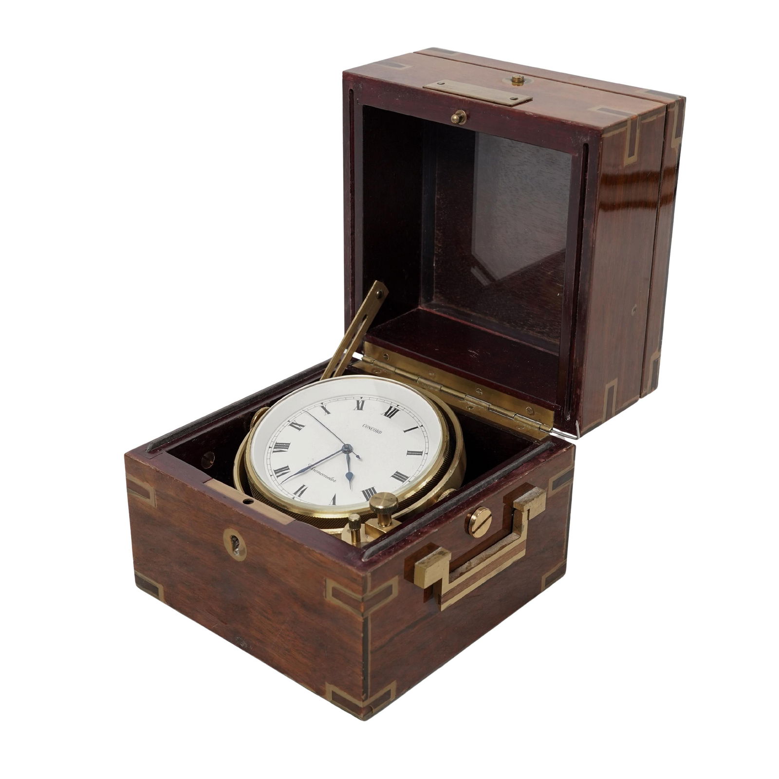 Concord Maritime Chronometer in Mahogany Case: Concord Maritime Chronometer in Mahogany CaseEarly to mid 20th century, SwissA brass Concord ships marine chronometer used for maritime navigation. Housed in a mahogany presentation case. Marked on cl