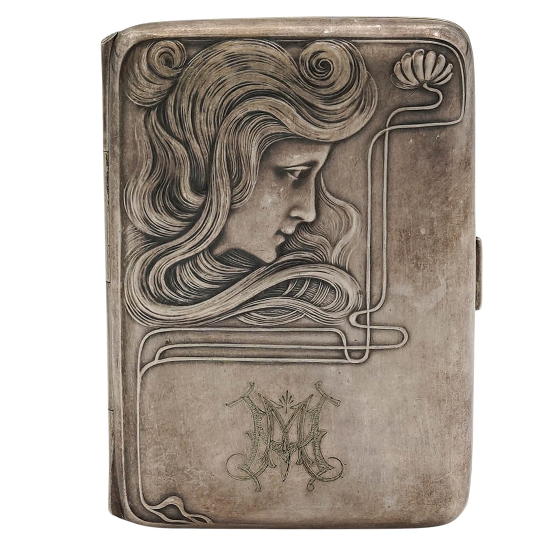 German Art Nouveau WMF Nickel Silver Cigarette Case: German Art Nouveau WMF Nickel Silver Cigarette Case1890-1910, GermanAn Art Nouveau WMF (Wurttembergische Metallwarenfabrik) nickel silver cigarette case. Features a relief of a woman's portrait and fl