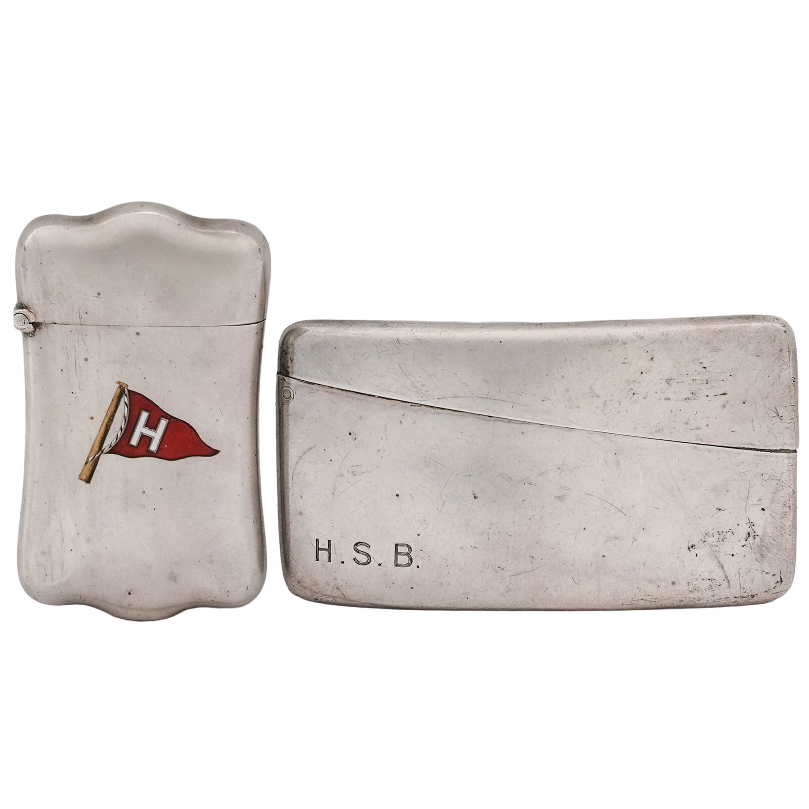 (2 Pc) Antique Sterling Silver Vesta Cases: (2 Pc) Antique Sterling Silver Vesta CasesLate 19th- Early 20th Century.(2 Pc) A pair of antique sterling silver vesta cases. This set includes:(1 Pc) Antique sterling silver and enamel vesta case of