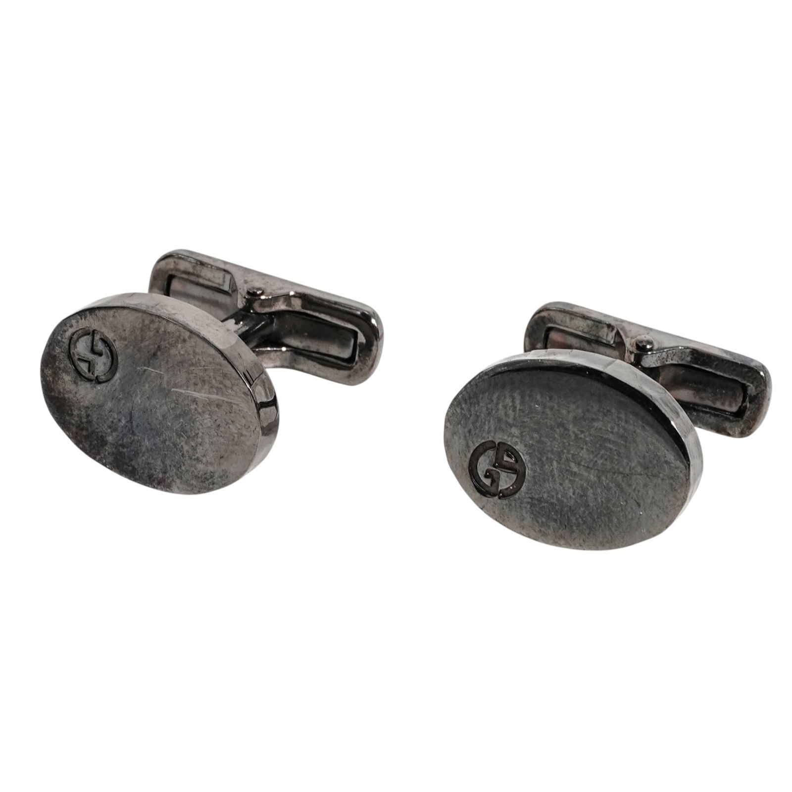 Giorgio Armani Sterling Silver Cufflinks: Giorgio Armani Sterling Silver Cufflinks21st Century. Italy.Giorgio Armani sterling silver cufflinks with oval form design. With 925 Sterling and Giorgio Armani hallmarks. Total weight: 13 grs. With G