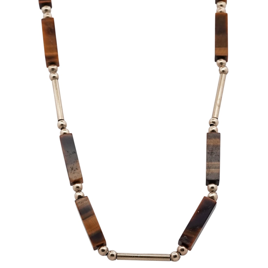 14k Gold & Tiger’s Eye Necklace: 14k Gold & Tiger’s Eye NecklaceLate 20th Century14\k yellow gold necklace composed of alternating polished tubular gold spacers and rectangular tiger’s eye beads exhibiting strong golden-brown cha
