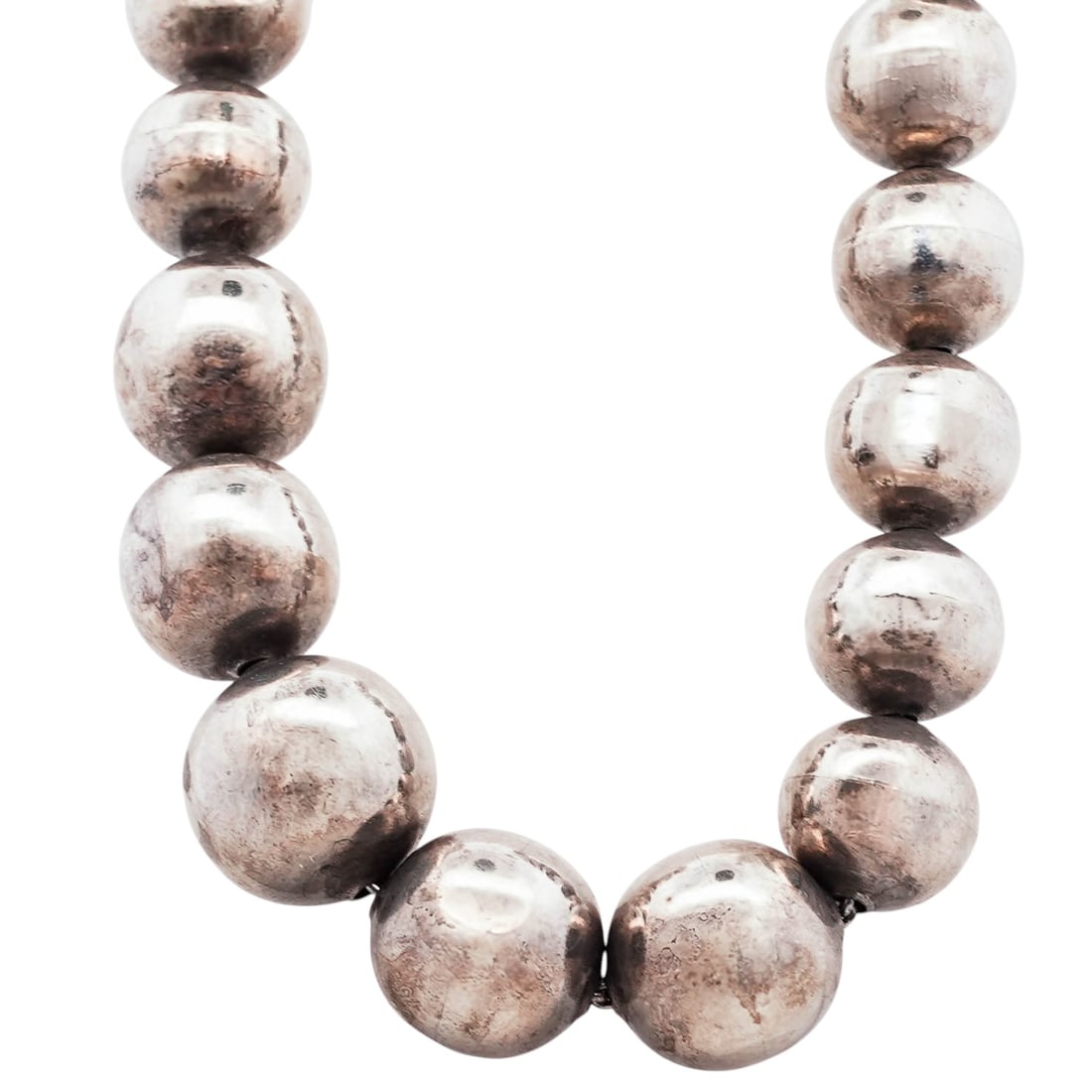 Vintage Mexican Sterling Silver Bead Necklace: Vintage Mexican Sterling Silver Bead Necklace1960s-1970s, MexicoVintage Mexican sterling silver bead necklace composed of large, uniformly sized spherical beads. Hook-and-eye closure. Stamped “MEXIC