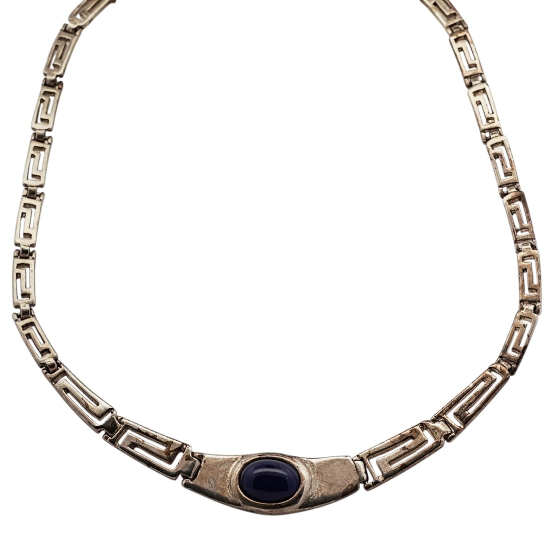 Vintage Sterling Silver & Lapis Lazuli Necklace: Vintage Sterling Silver & Lapis Lazuli Necklace1970s-1980sSterling silver necklace composed of articulated geometric openwork links, centered by a bezel-set lapis lazuli cabochon measuring 9.8 × 7.25