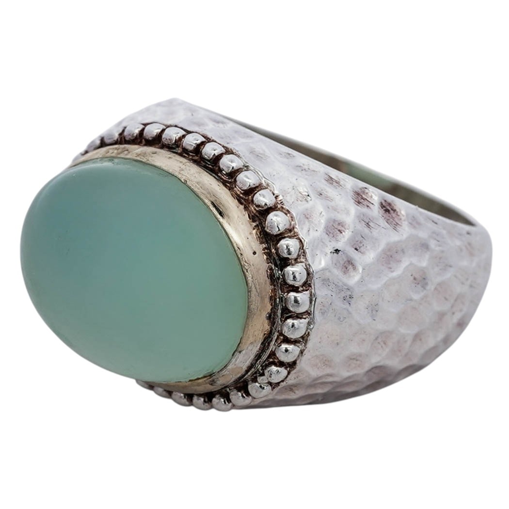 Vintage Sterling Silver 14k Gold & Green Chalcedony Ring Signed: Vintage Sterling Silver 14k Gold & Green Chalcedony Ring SignedLate 20th Century, ThailandVintage sterling silver ring set with an oval green chalcedony cabochon measuring approximately 17x13 mm, secu