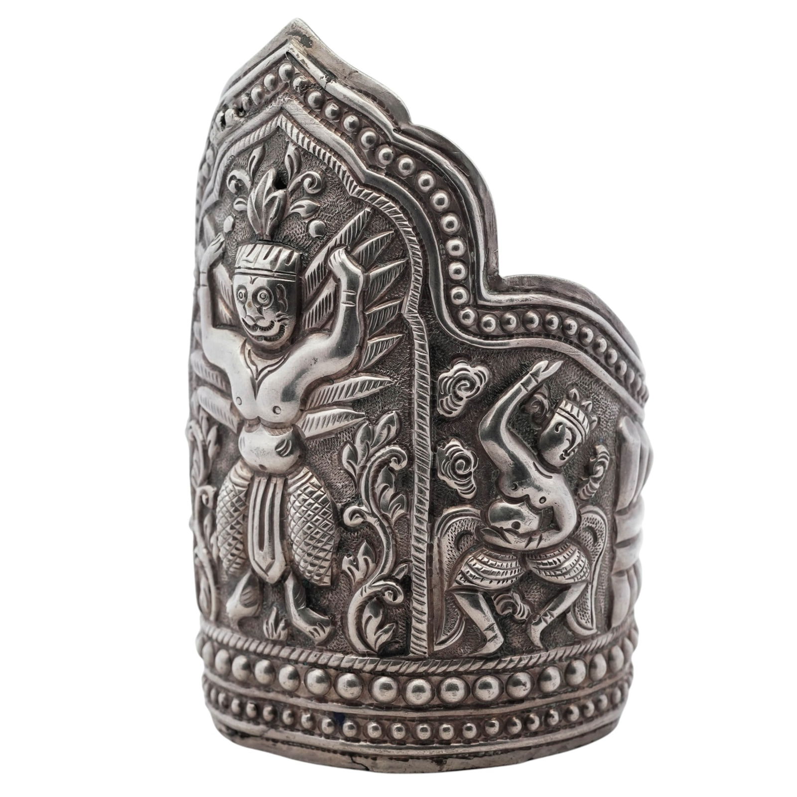 Vintage Chinese Export Silver Repousse Cuff Bracelet: Vintage Chinese Export Silver Repousse Cuff Bracelet1970s-1980s, ChinaLarge silver cuff bracelet featuring a high-relief repoussé figural panel depicting a stylized guardian or deity figure within an