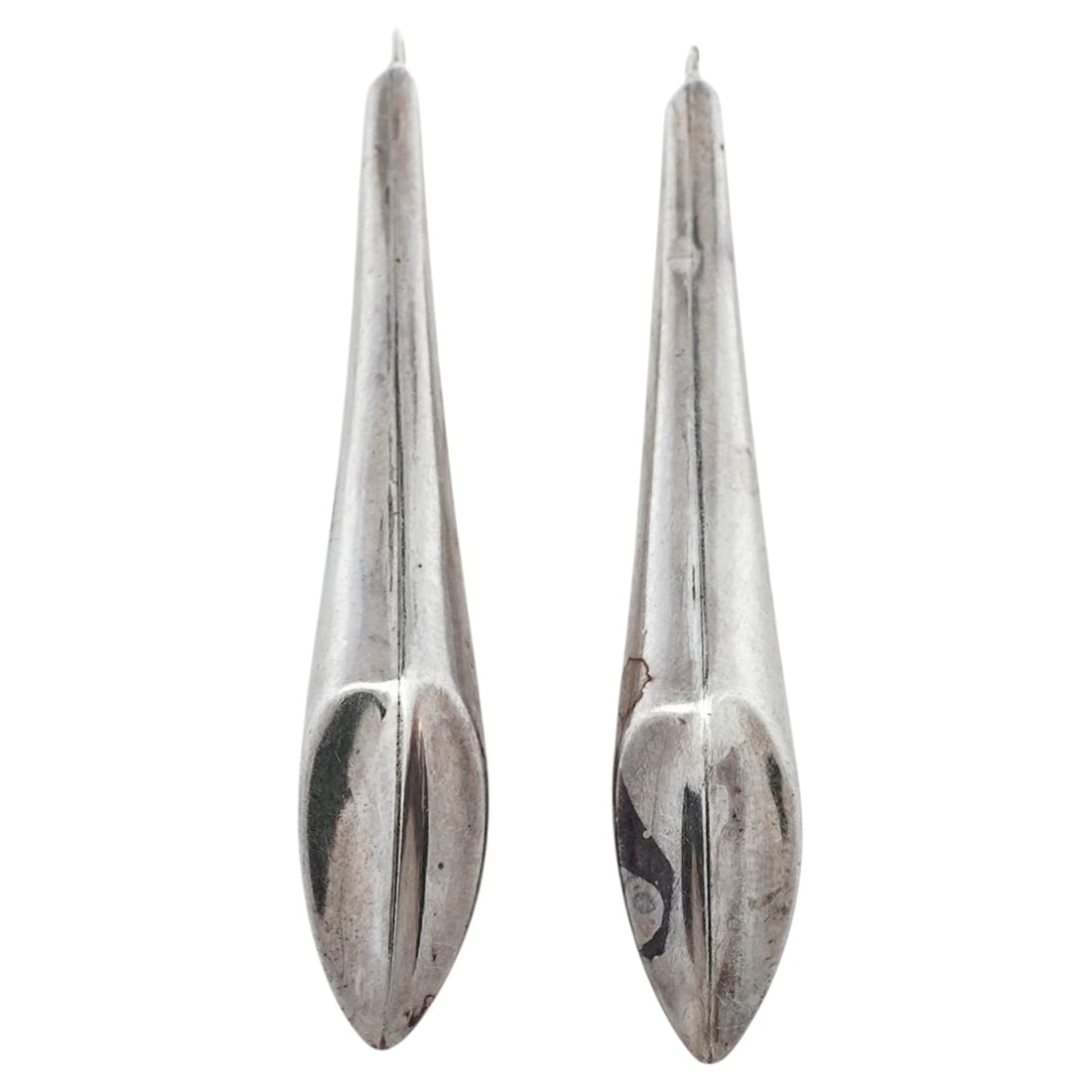 Vintage Sterling Silver and 14K Gold Drop Earrings: Vintage Sterling Silver and 14K Gold Drop Earrings1970sPair of elongated tapered drop earrings in sterling silver with applied 14K gold accent edge. Hook wire backs. Interior stamped “PBD,” ��