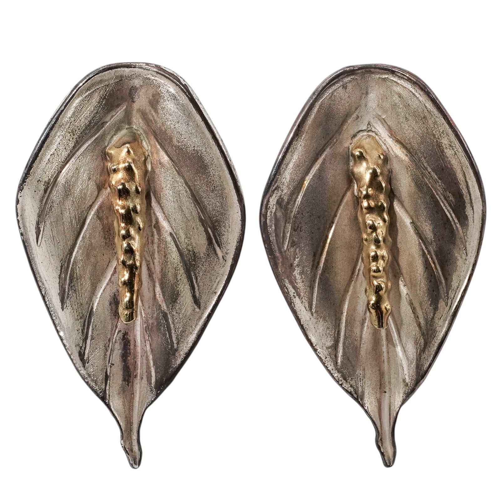 J. Gabriel 18K & Sterling Silver Leaf Earrings: J. Gabriel 18K & Sterling Silver Leaf Earrings1980s, USALarge, sculptural leaf-motif earrings by studio jeweler Janet Gabriel. Features matte-finished sterling silver leaf "petals" accented with 18K y