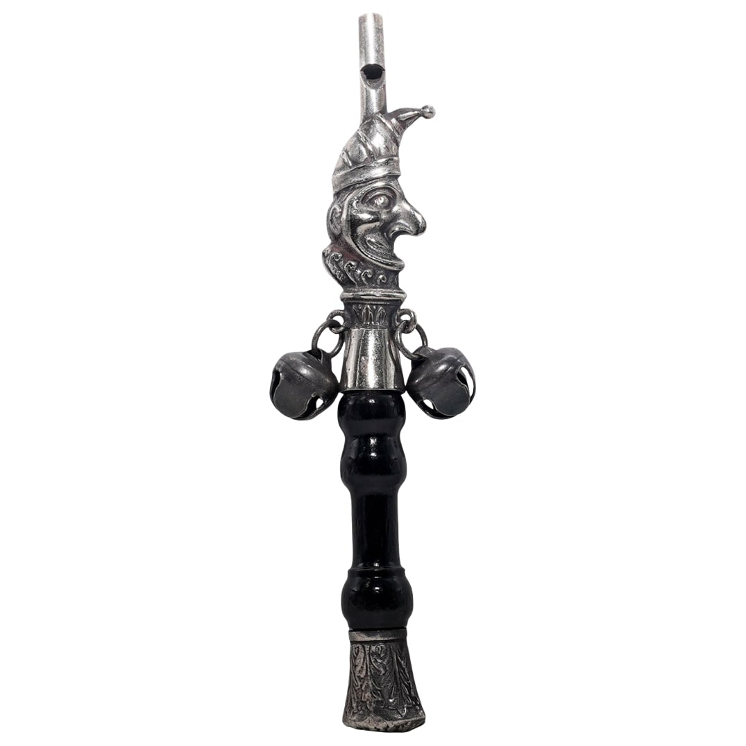 Victorian "Mr. Punch" Sterling Silver Baby Rattle And Whistle: Victorian "Mr. Punch" Sterling Silver Baby Rattle And WhistleLate 19th century, EuropeanThis antique was a popular novelty design from the late 19th century. It features a sterling silver character he