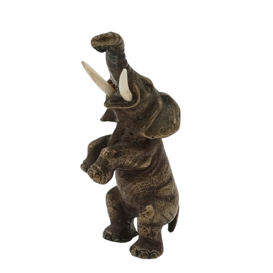 Antique Bronze & Bone Elephant Figurine: Antique Bronze & Bone Elephant FigurineEarly 20th centuryPatinated cast bronze miniature elephant figurine with carved bone tusks. It is depicted standing on its hind legs with a raised trunk.H: 2.25"