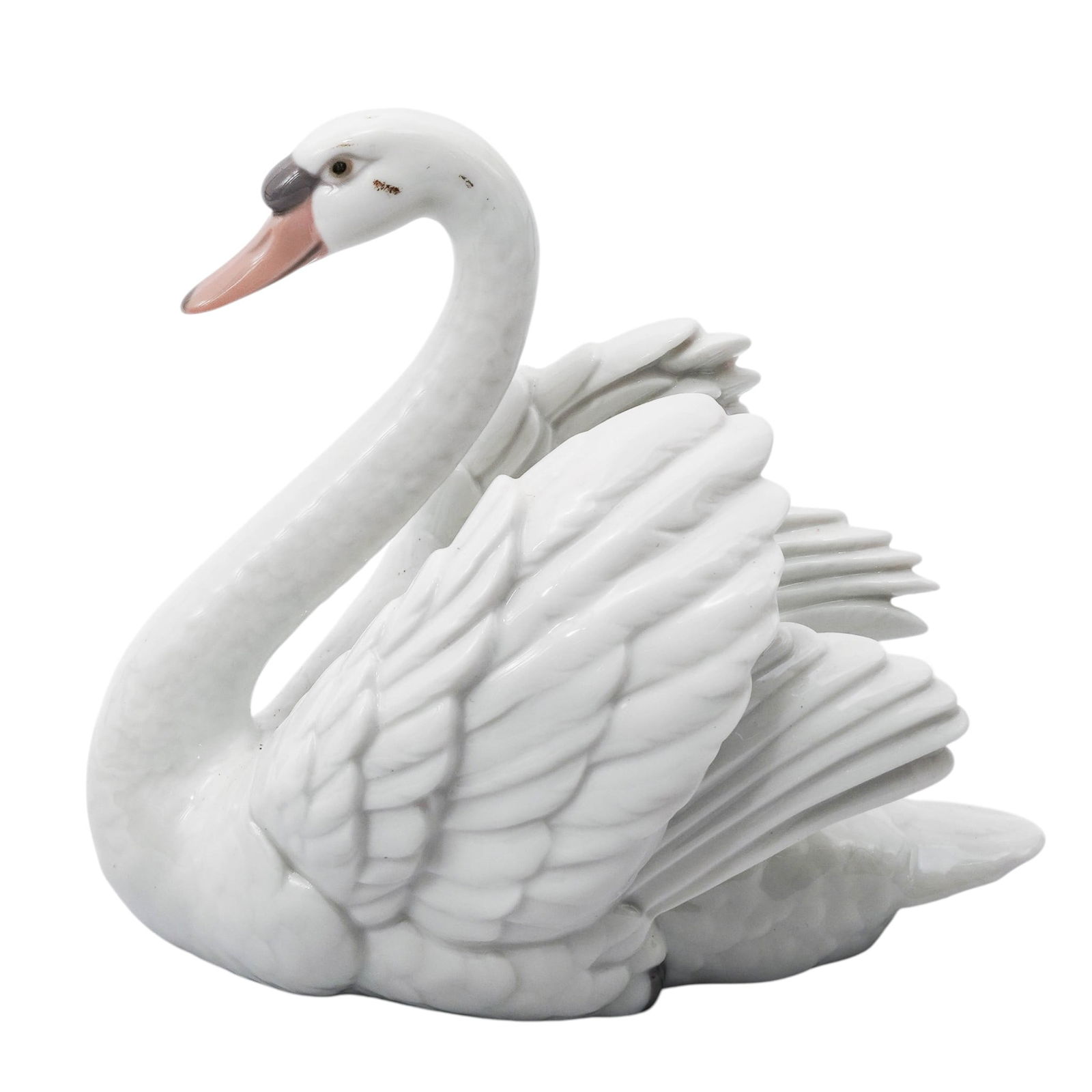 Lladro Porcelain "Swan with Wings Spread" Figurine: Lladro Porcelain "Swan with Wings Spread" Figurine1984-2007. Spain.Lladró porcelain figurine sculpture, in white glazed porcelain, depicting a "Swan with Wings Spread". Designed by sculptor Francisco