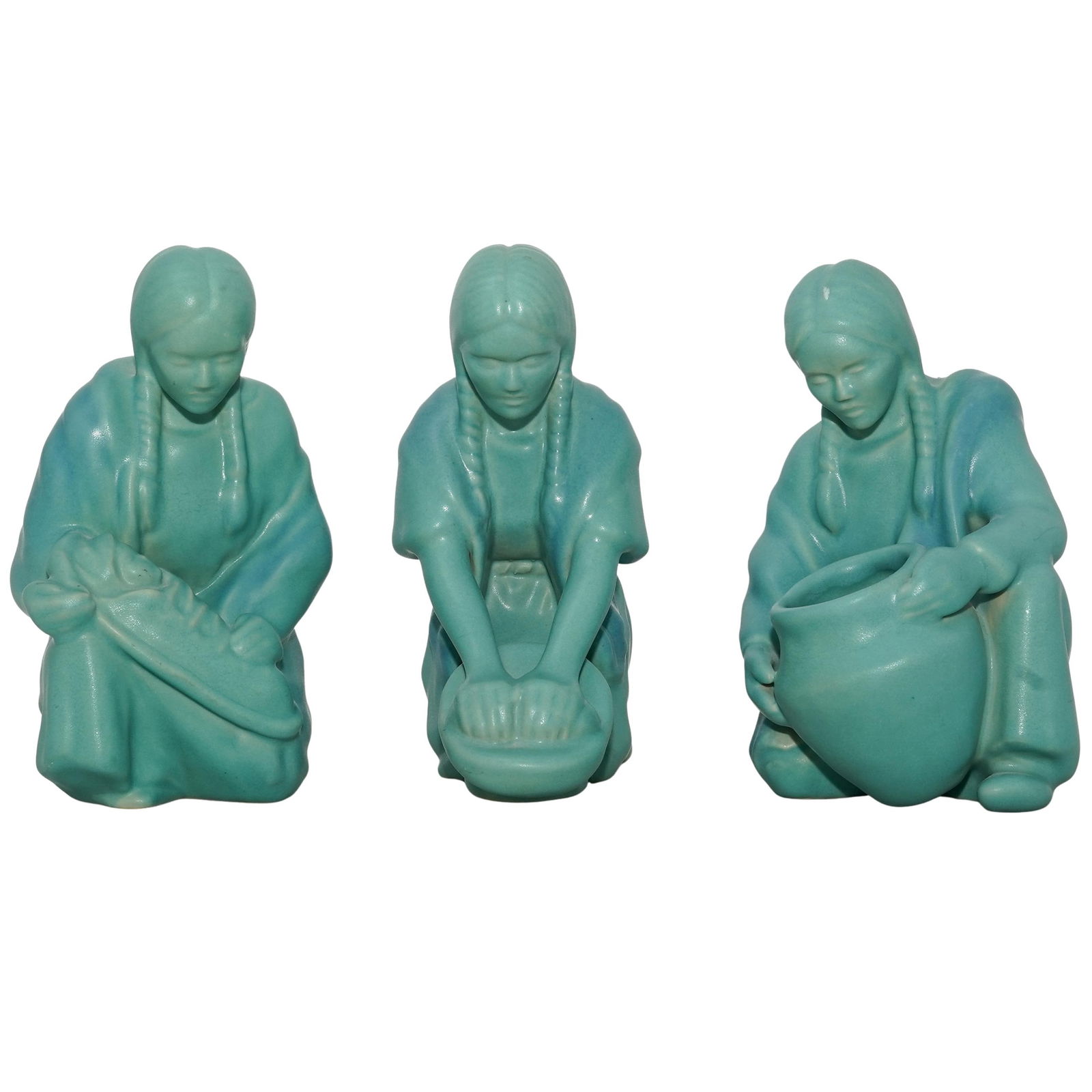 (3 pc) Van Briggle Native American Art Pottery Sculptures: (3 pc) Van Briggle Native American Art Pottery Sculptures20th century, USAThe lot includes:(1) Indian Maiden with Pot / M.B. ( designed by Mark Basham, finisher)(1) Indian Girl grinding Corn / A.G. (d